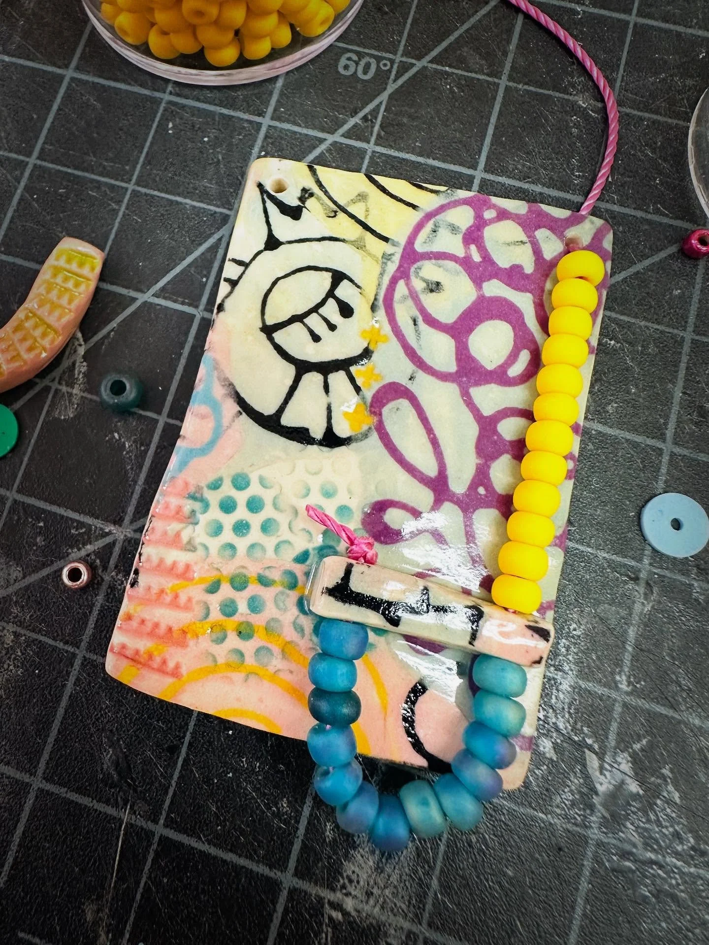 Beads, please!  Once the ceramic components are done it's time to figure out the beads and stringing and putting it all together.  #ceramicjewelry #ceramicartist #artjewelry #jewelrydesigner #shopsmall #underglaze #beadedjewelryofinstagram #ilovebead