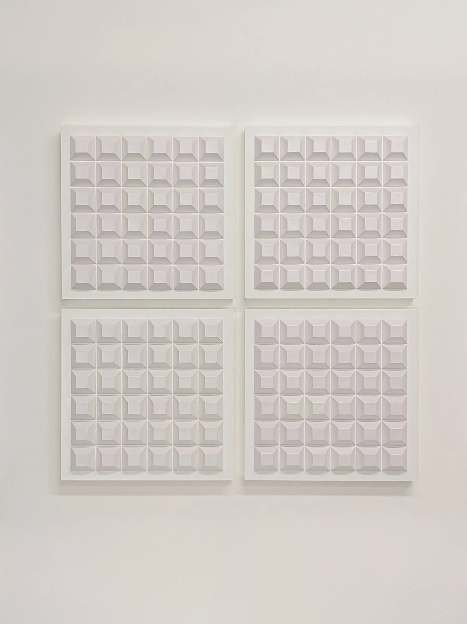  Meditation 9 , 2025, paper on four wood panels, 37 x 37 in. overall, 18 x 18 in. each panel