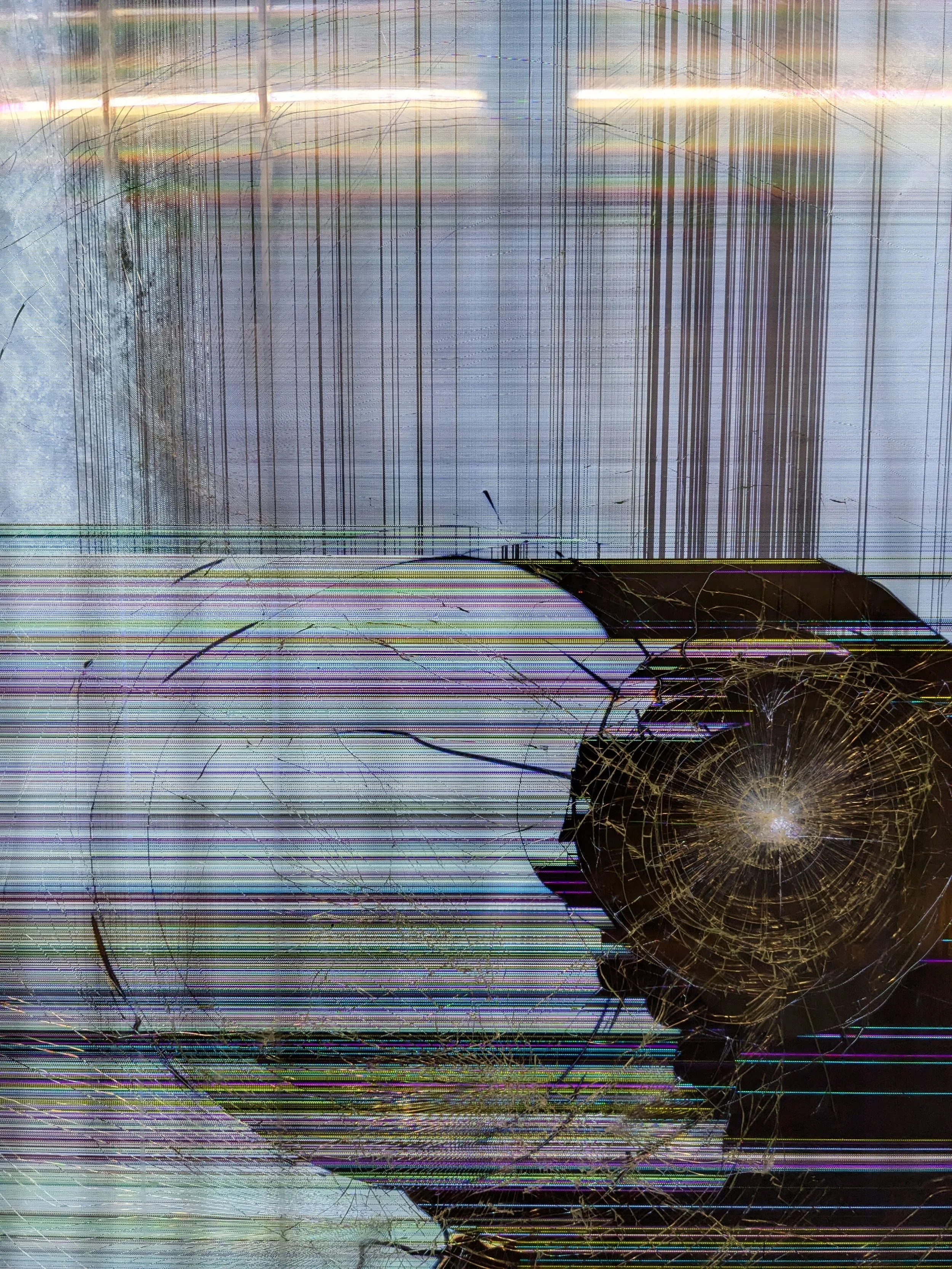 A distorted image with vertical lines and cracks, primarily black and purple colors, with some bright white and golden highlights, possibly a broken or damaged screen.