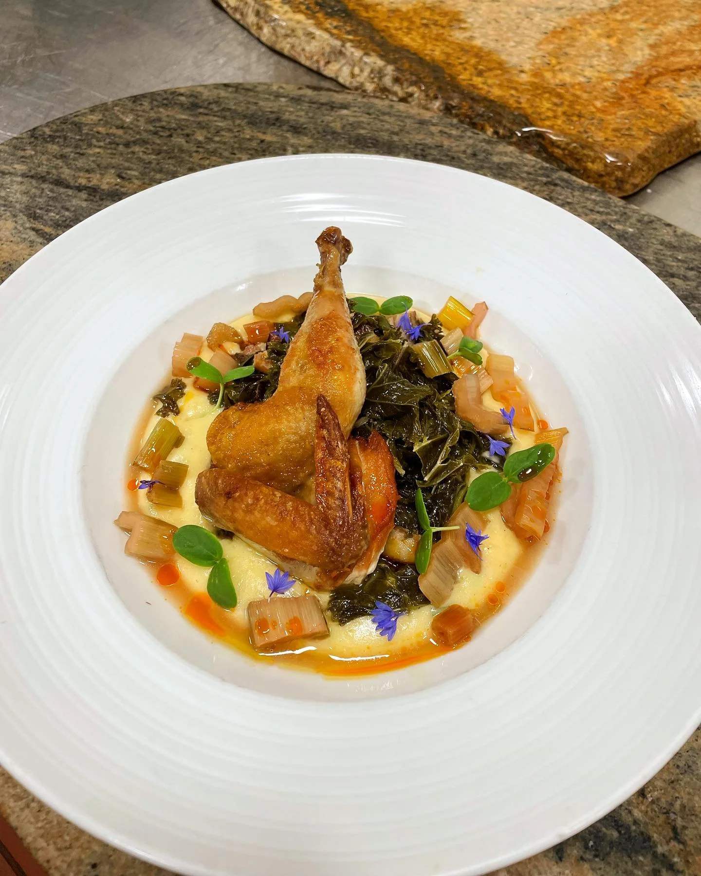 Cornish hen, collard greens, potato aligot, pickled Swiss chard, cantaloupe from @forevergreen.farm and @wellfedfarmstead
