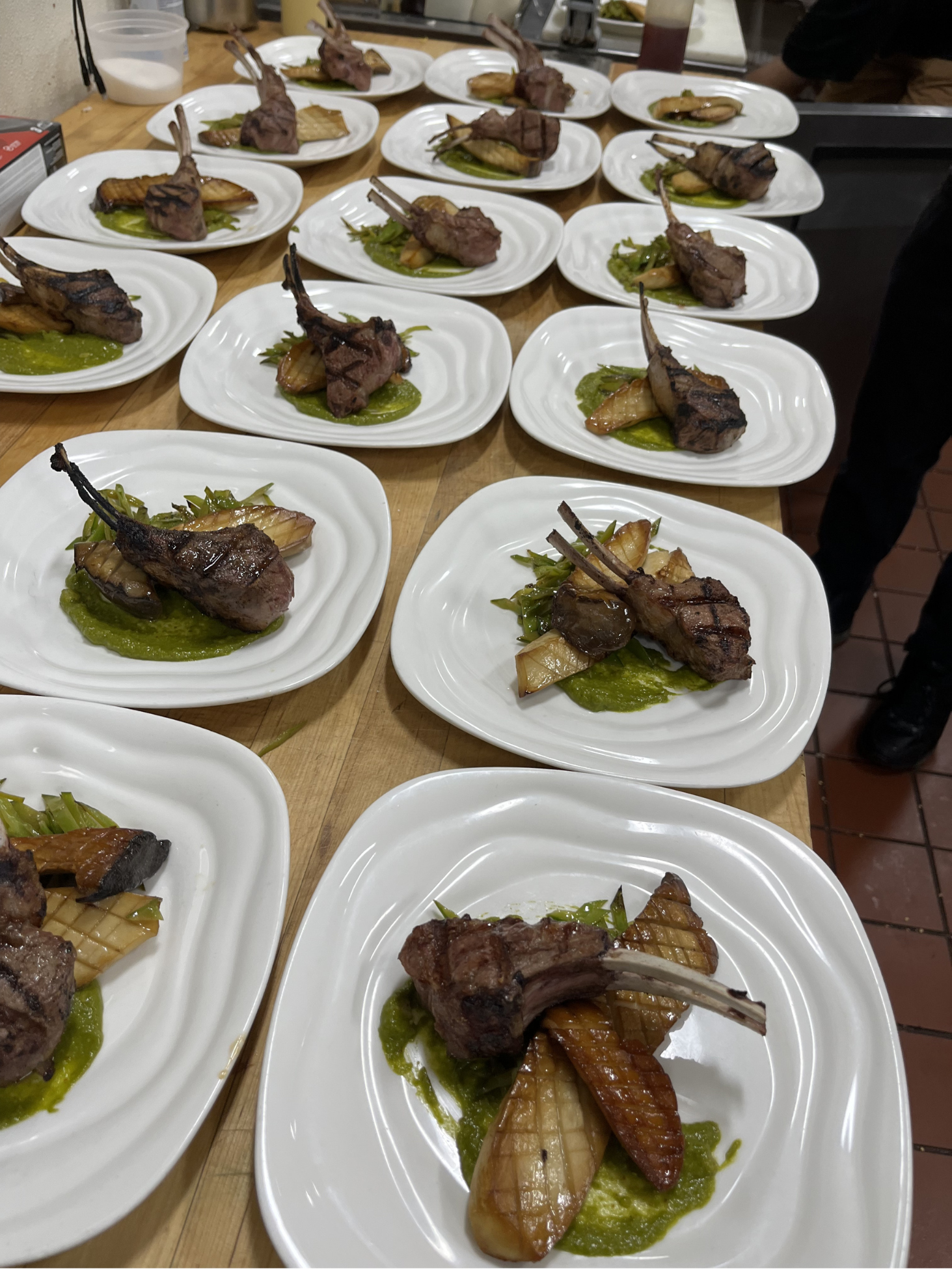 Many plates of lamb shank entrees