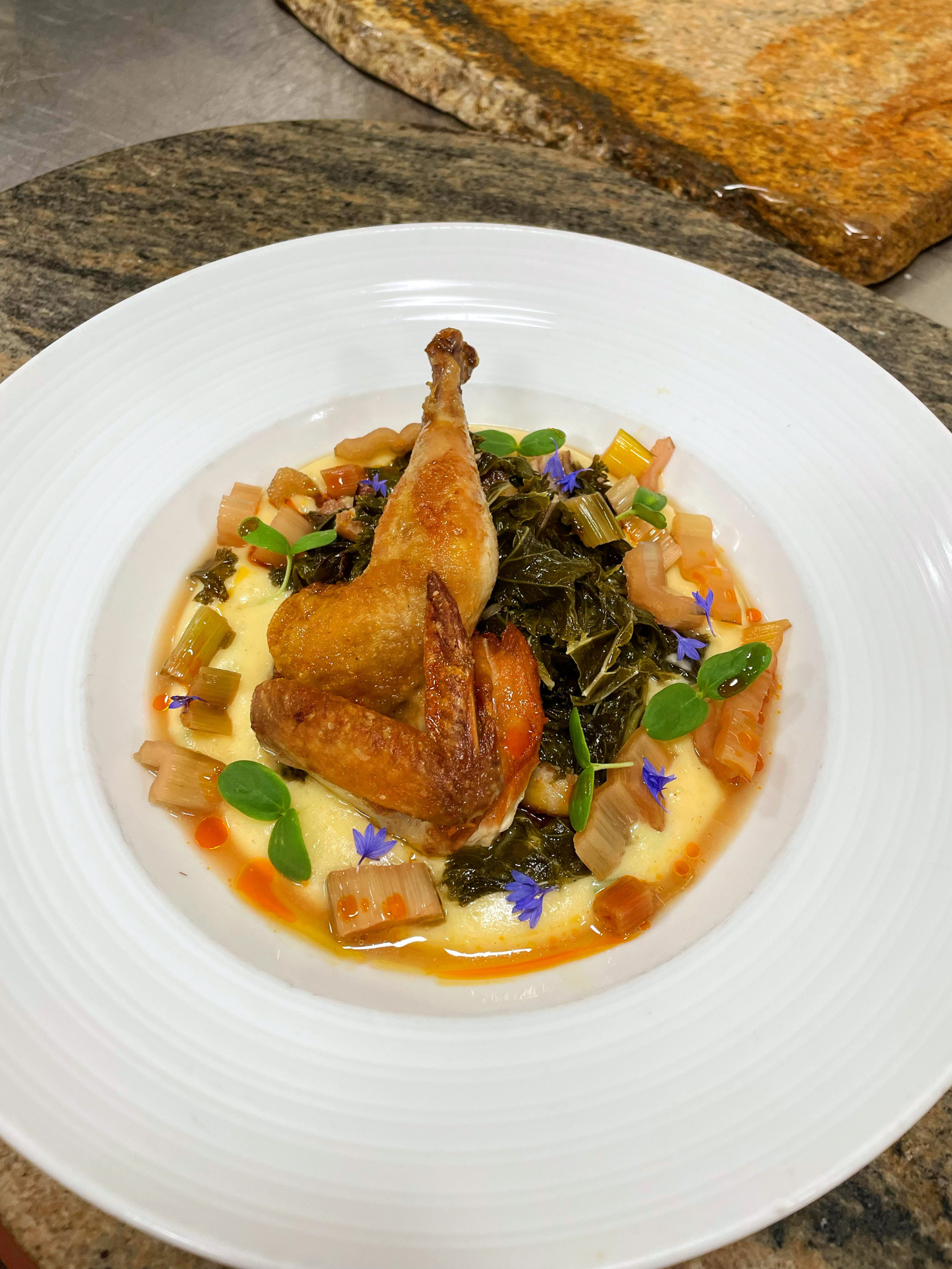 A beautifully-plated gourmet poultry dish