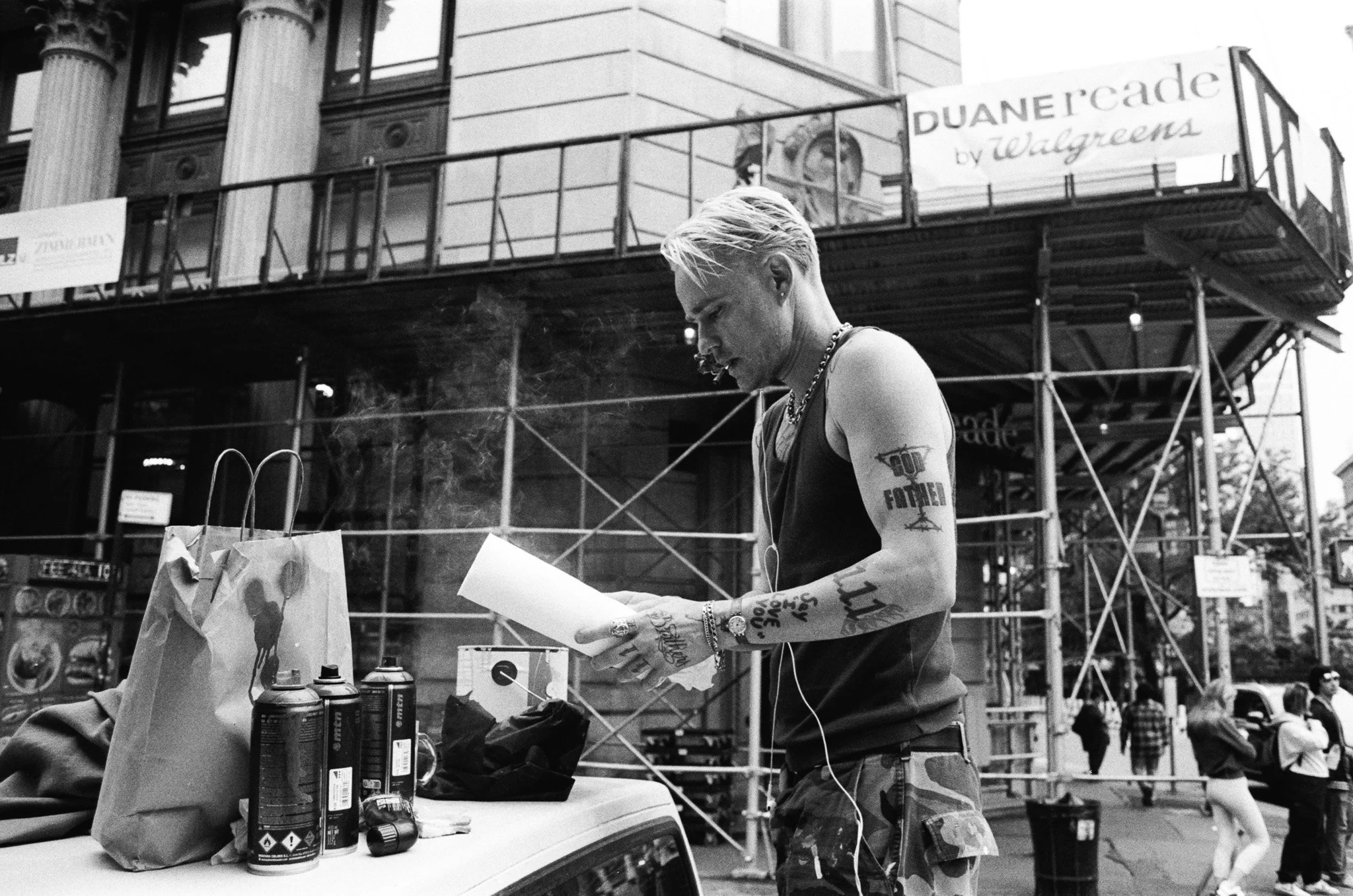 Sean Martini, creator of Say "I Love You" painting his truck and an original piece for Isa after sharing a personal and moving story on the origin of the phrase.
