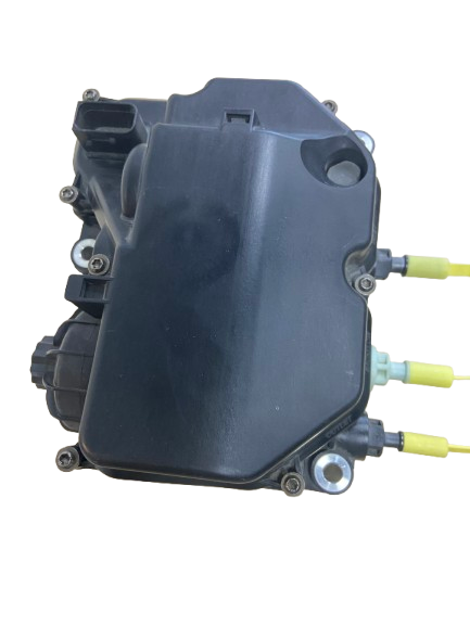 Mechanical or electronic component with multiple connectors and mounting points, black casing, and yellow wires attached.