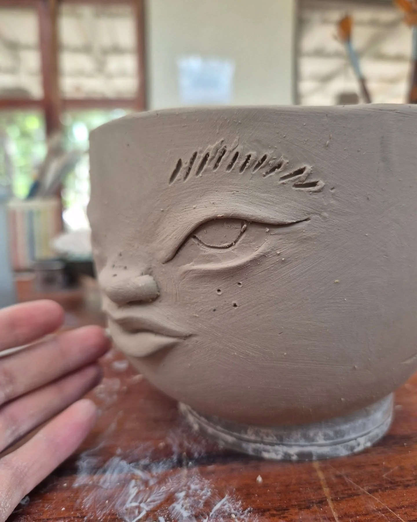 I like these new faces that come out over time, watching faces, playing with clay...