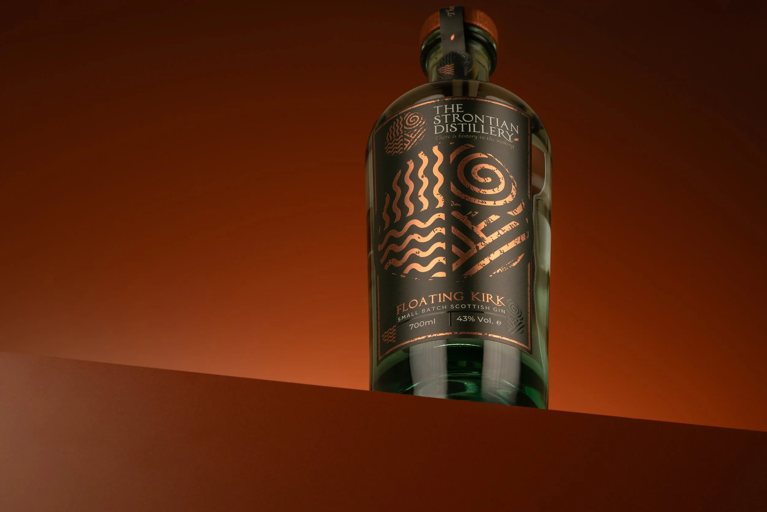 Strontian Gin Floating Kirk bottle photograph taken from below