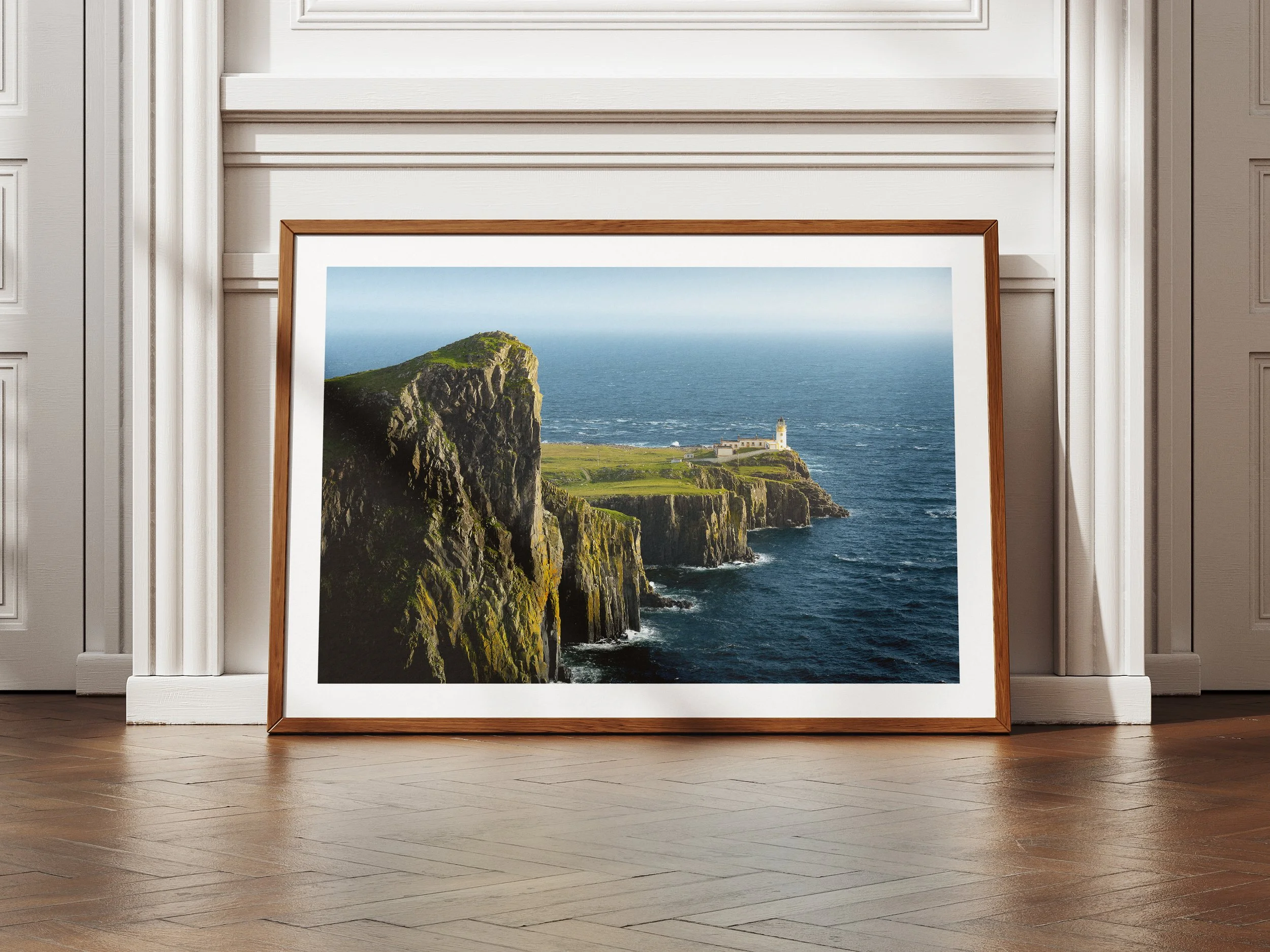 A framed picture of neist point lighthouse on isle of skye