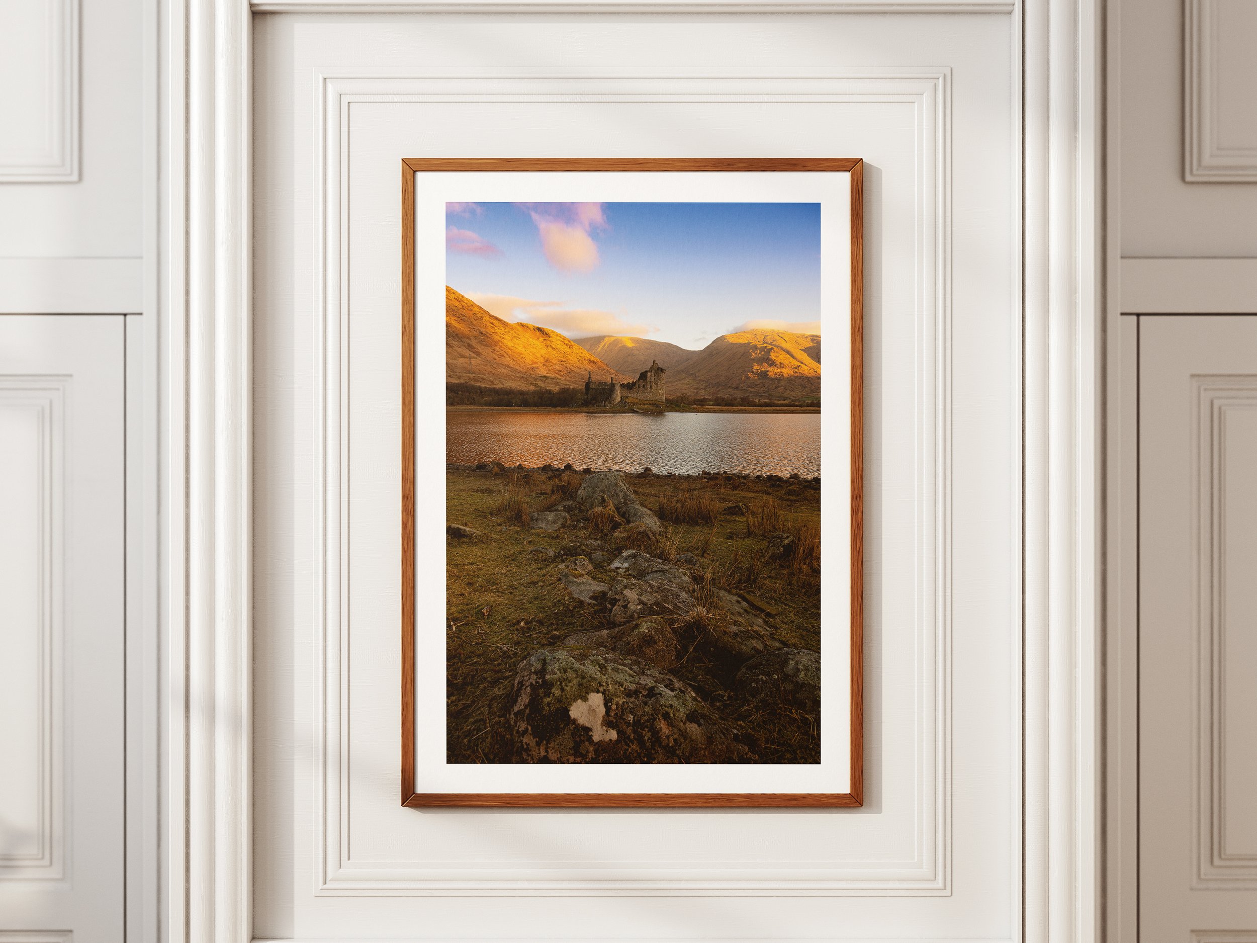 A framed picture of Kilchurn Castle in the Morning Glow
