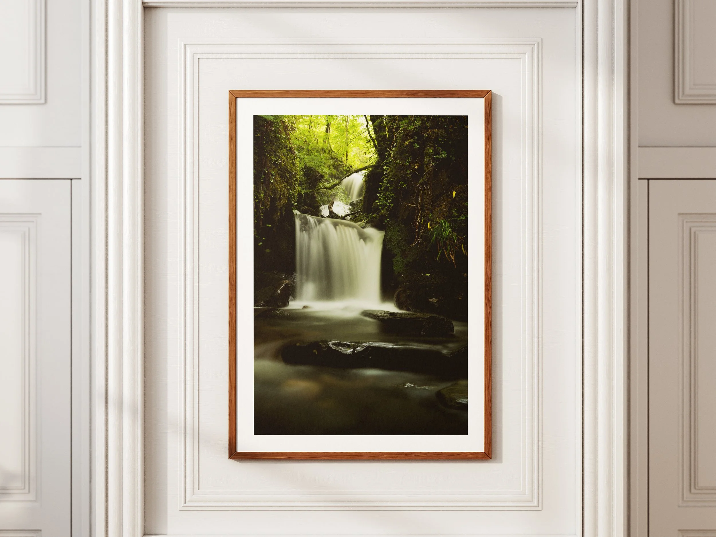 A framed picture of the Falls At The Fairy Bridge