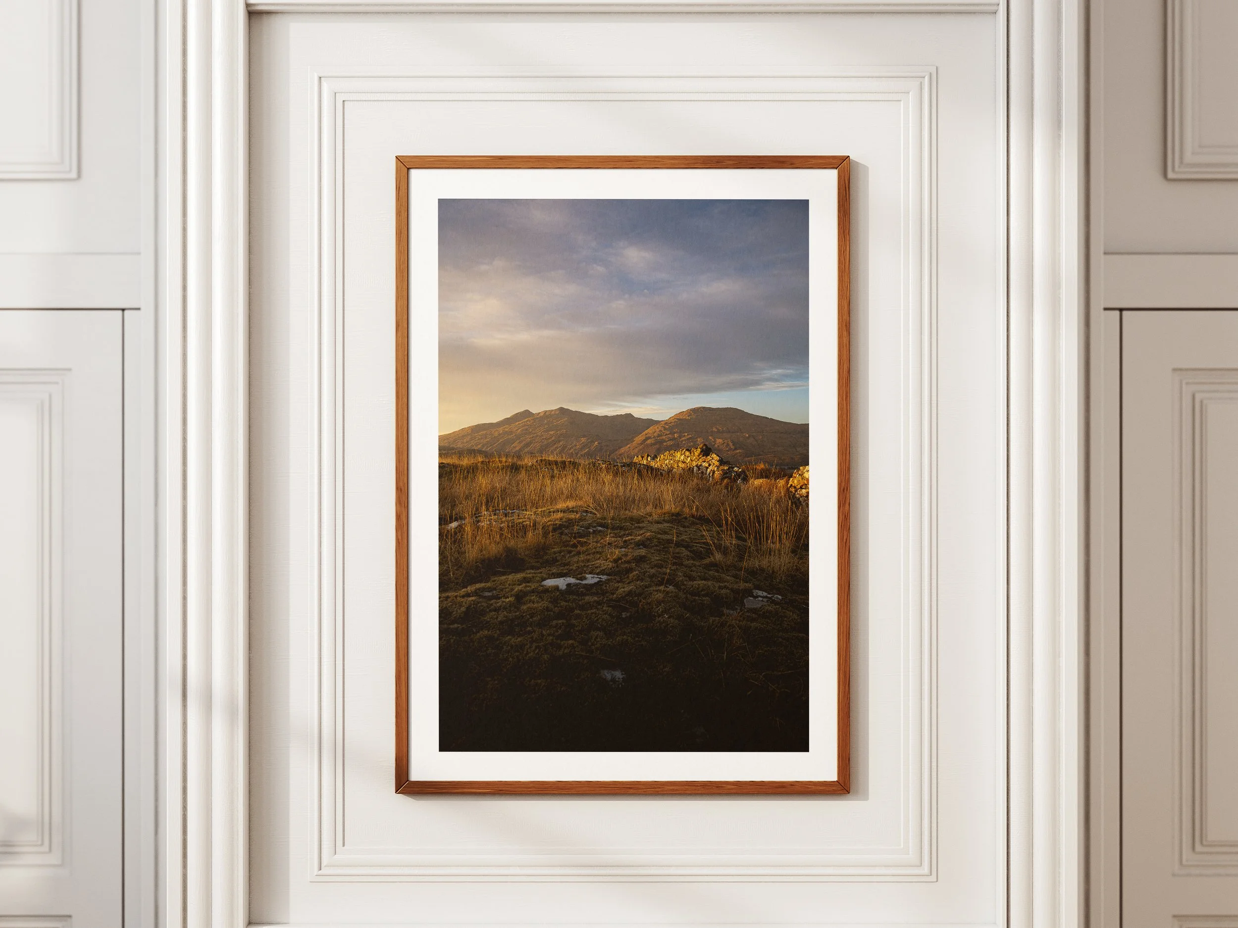 A framed picture of ben cruachan at sunset