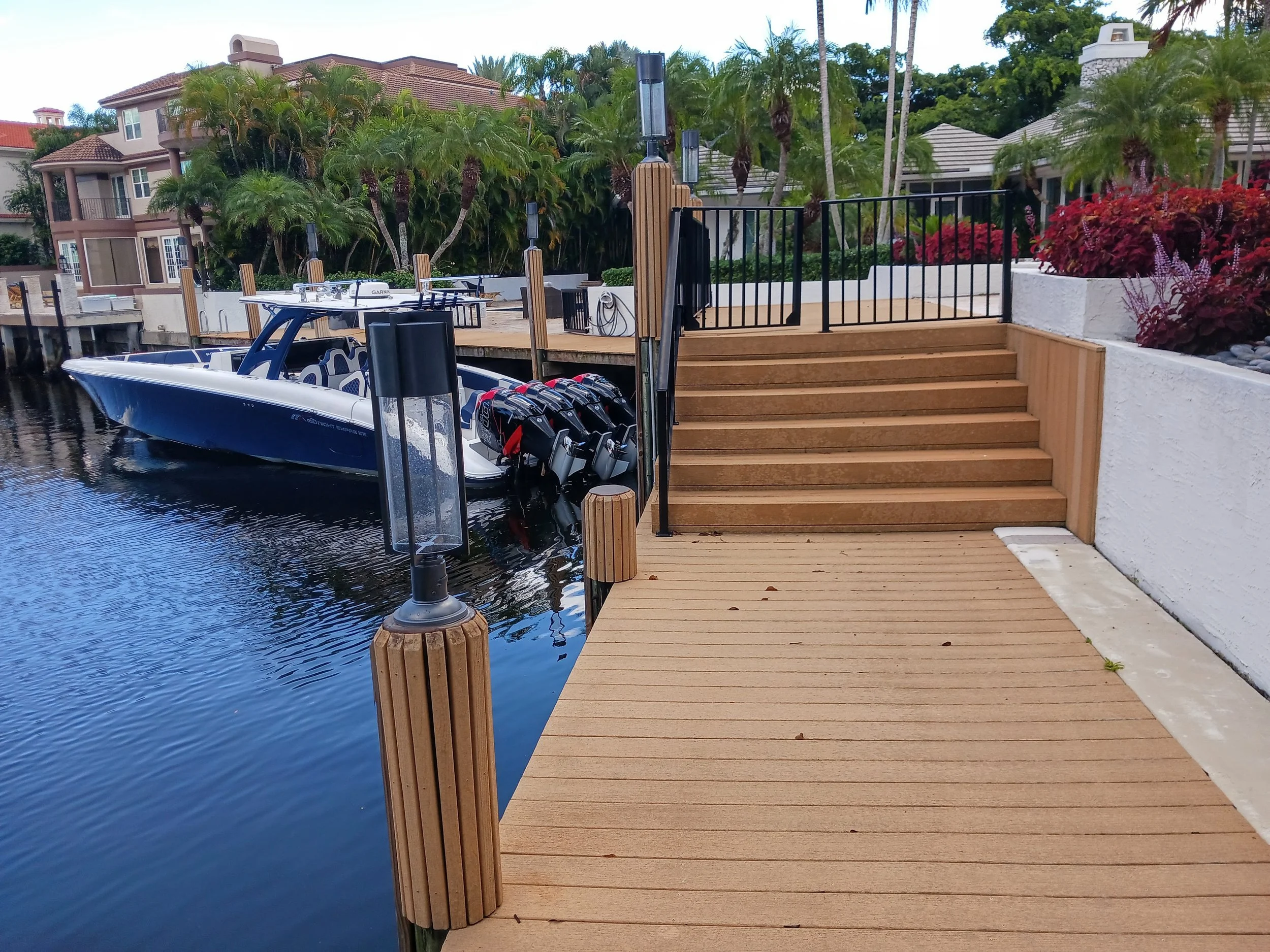 Dock with stairs and pilings with slats
