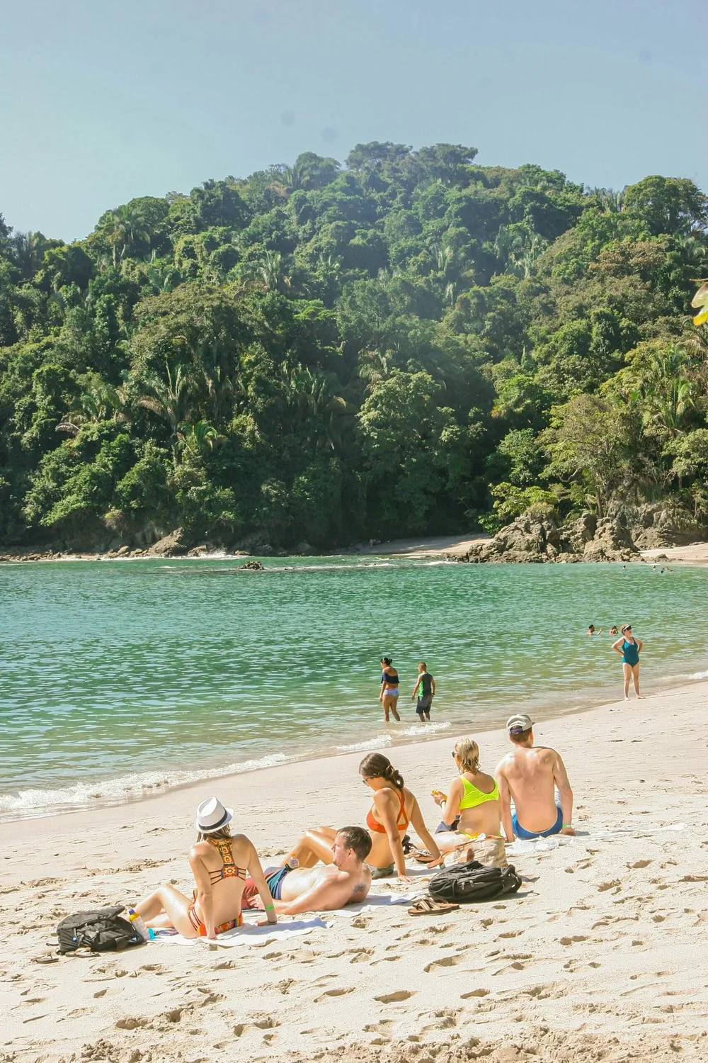 costa-rica-beach-tourists.webp