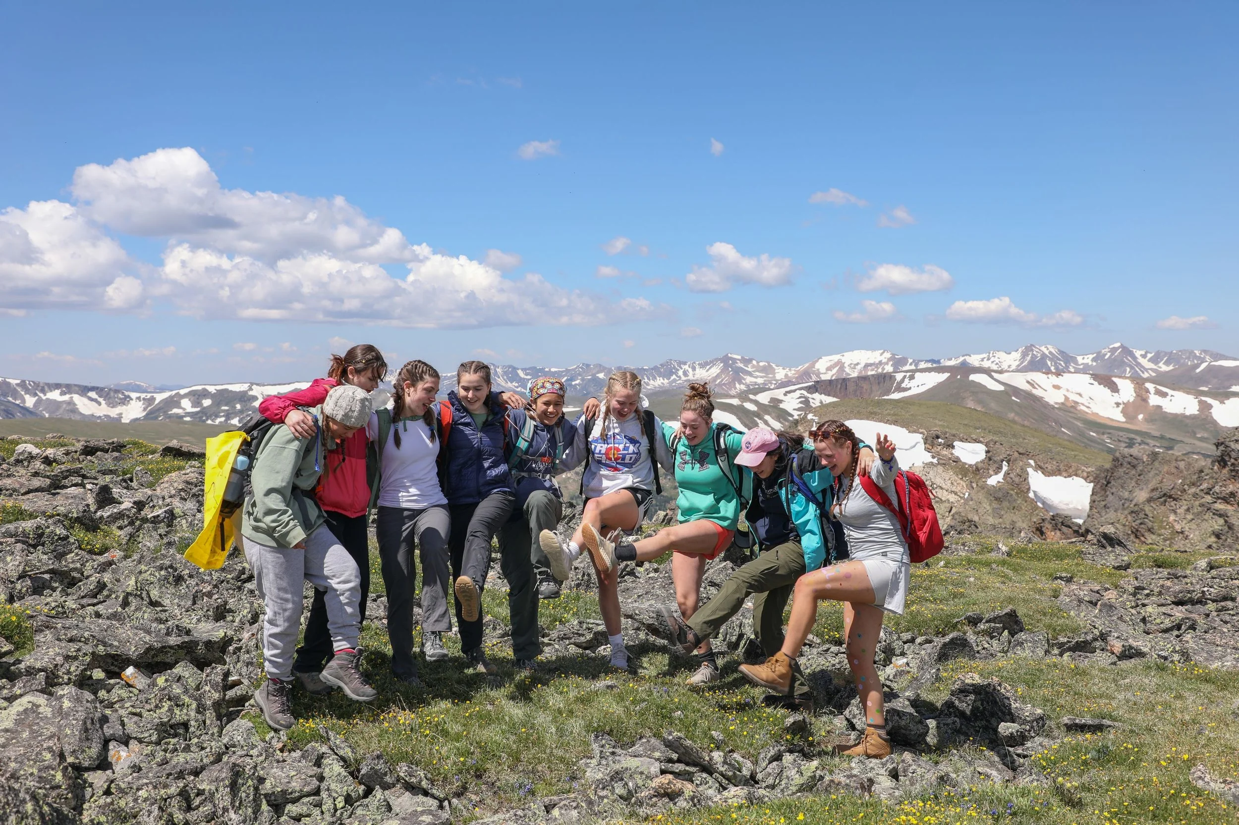 high school girls on a mountain top in colorado