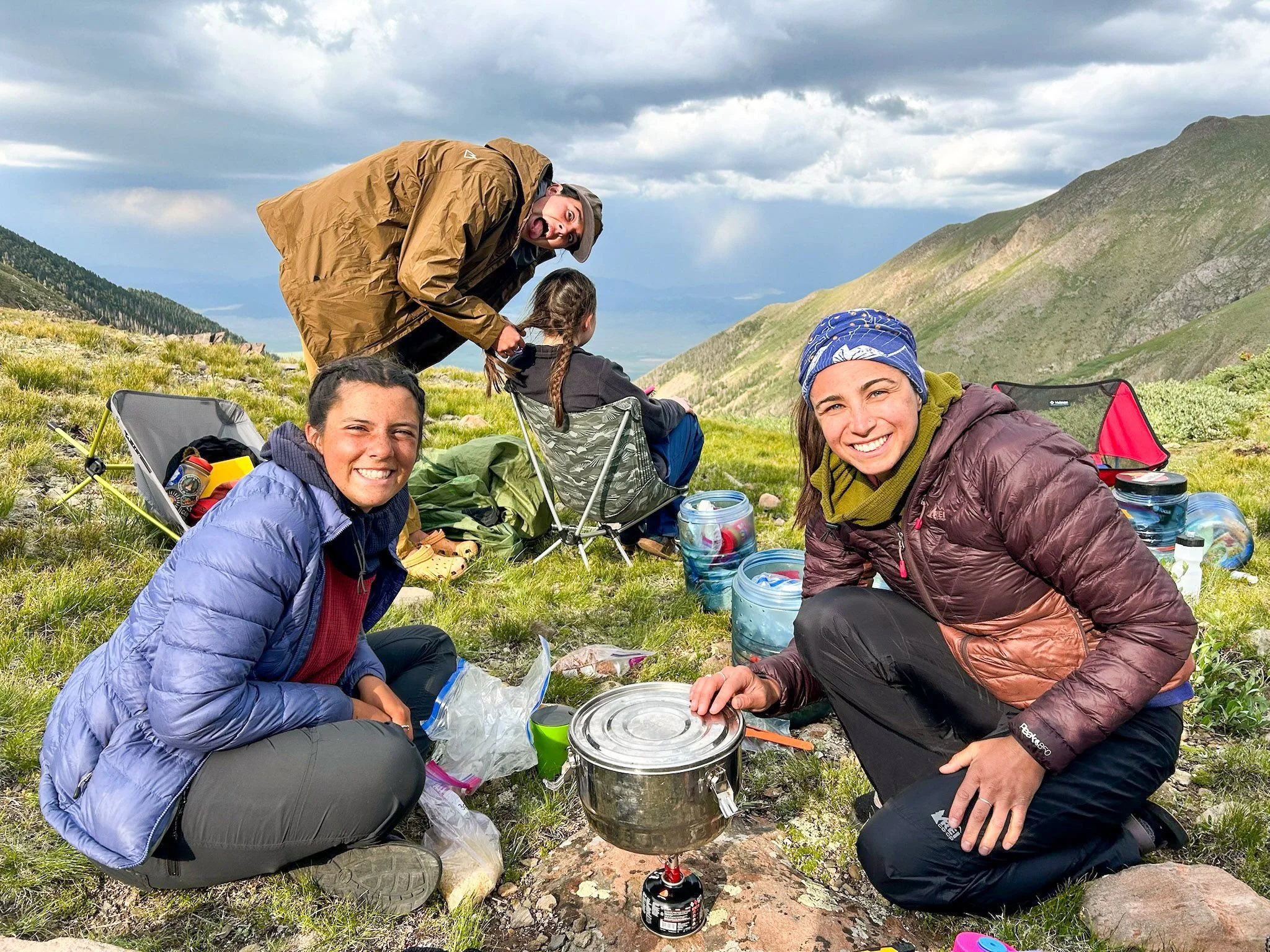 girls backpacking at summer camp