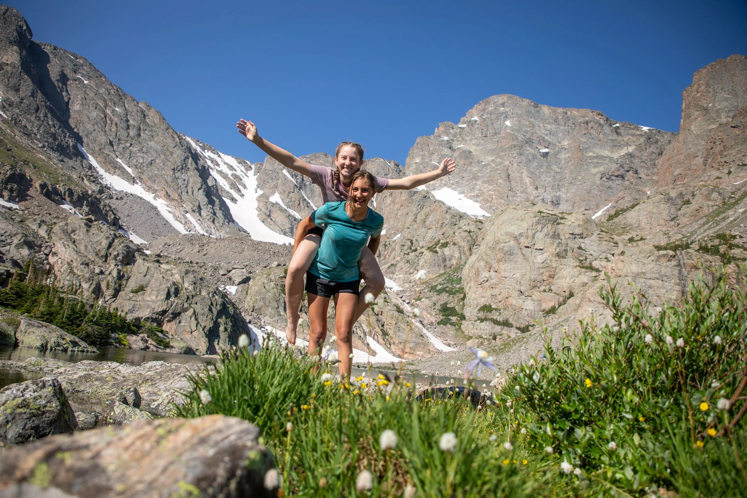 Two high school girls hiking in Rocky Mountain National Park in Colorado