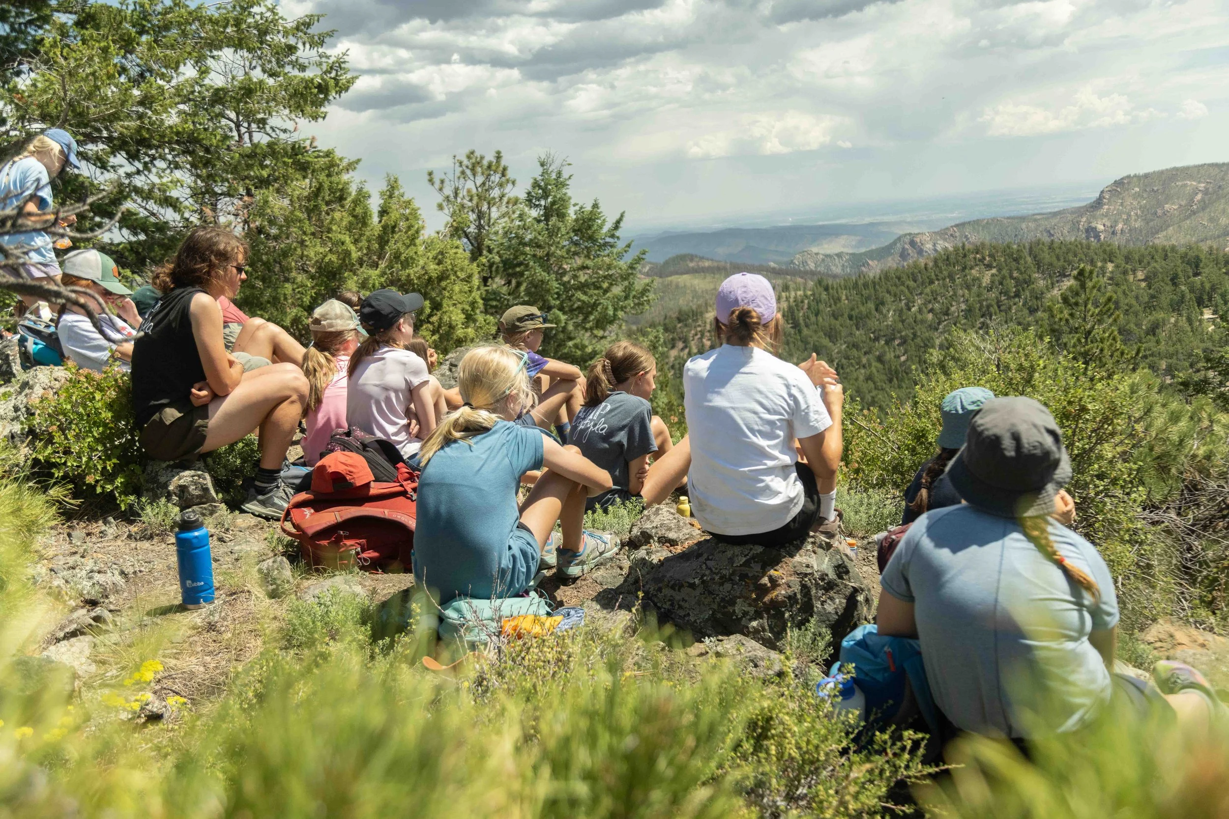 middle school girls on a hike at catholic summer camp in colorado