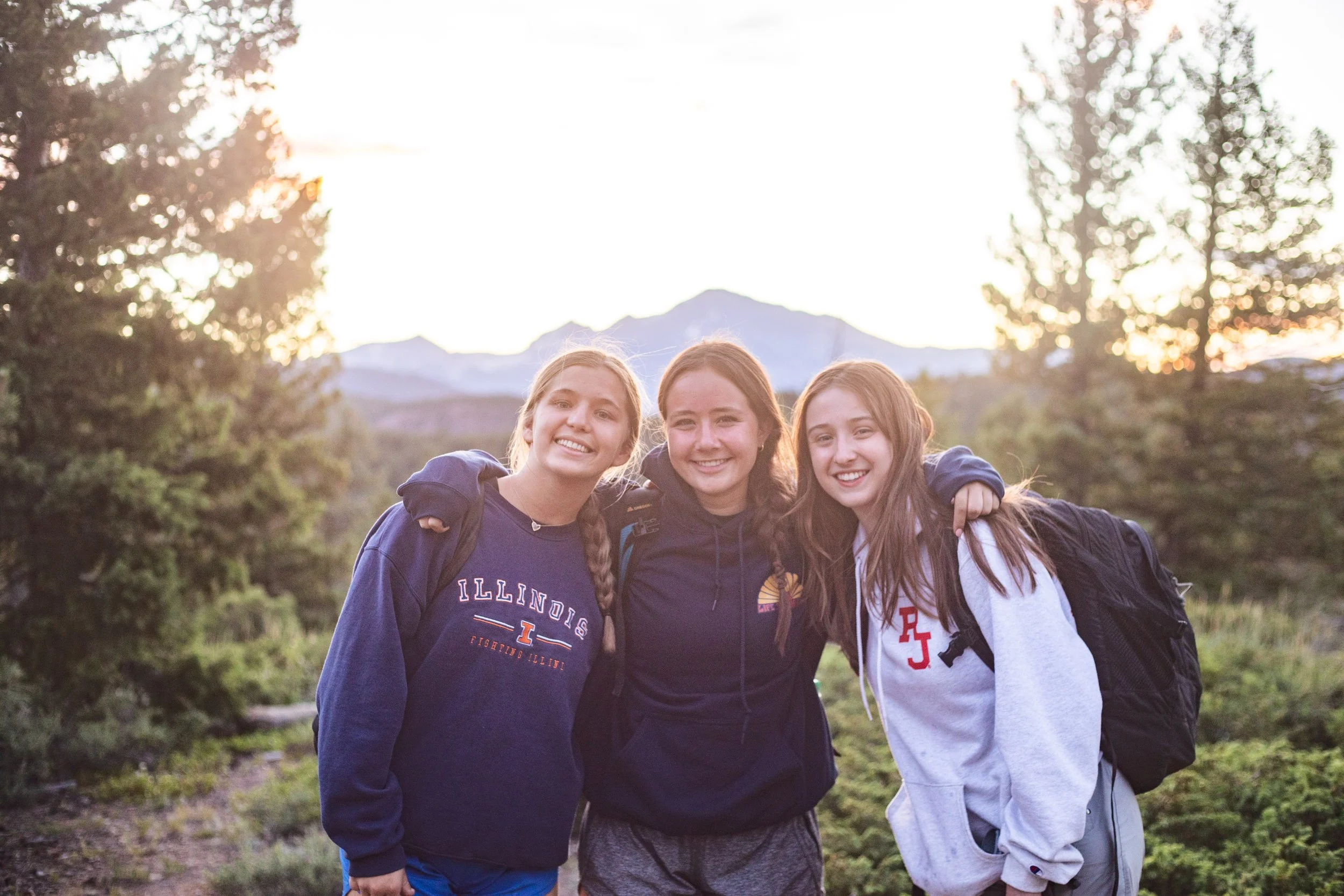 three high school girls at a Catholic summer camp in Colorado