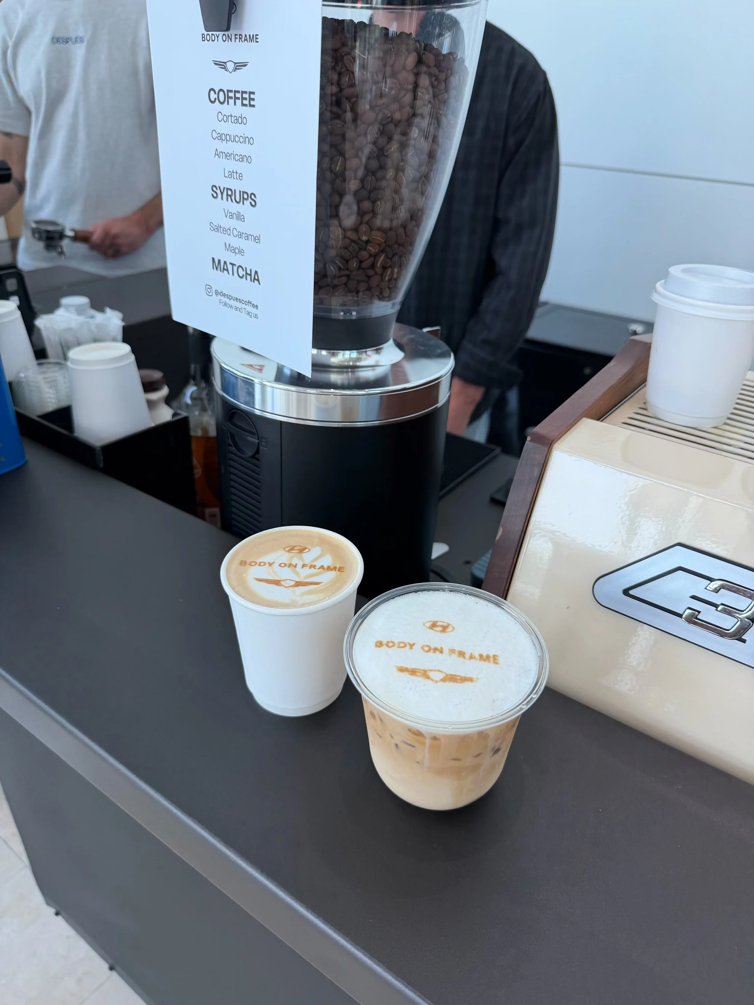 A Newport Beach coffee cart creates custom branded drinks for guests at a private event.