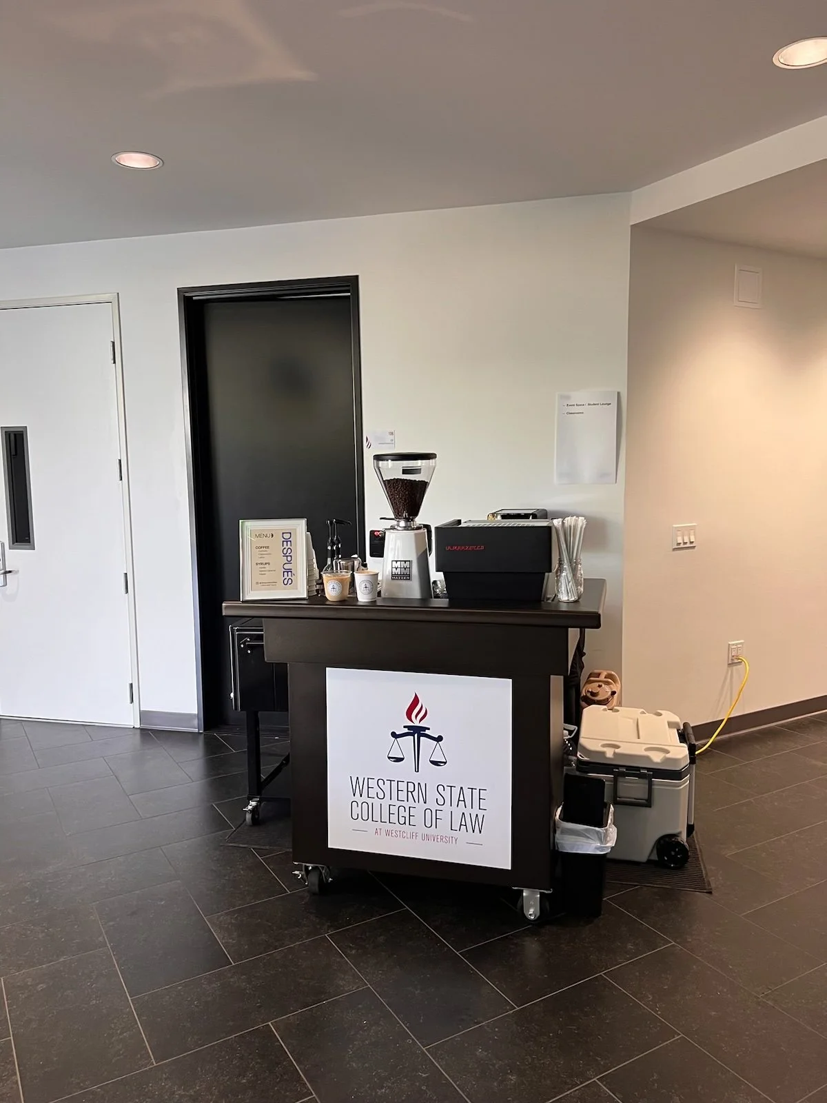 Coffee cart in Newport Beach with custom branded coffee cart serves lattes at a private event.