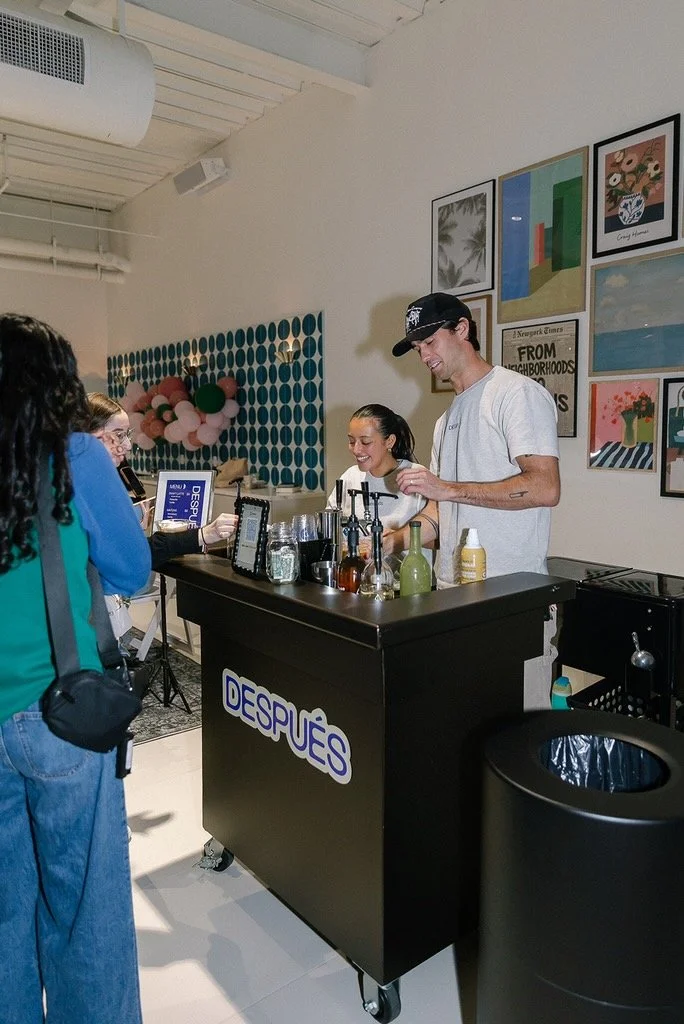 A mobile coffee cart create made-to-order drinks for guests at a brand activation in Orange County, CA
