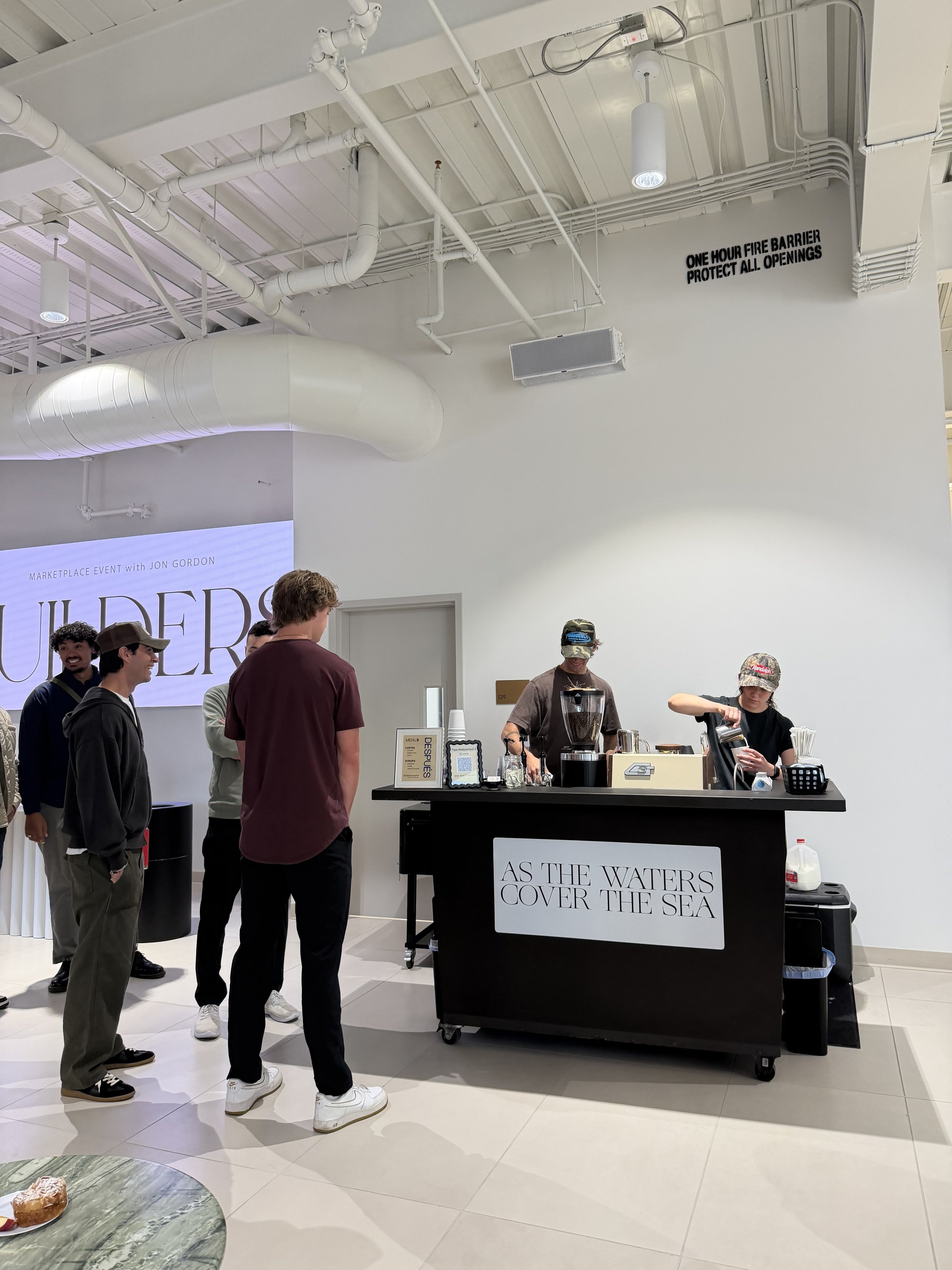 professional baristas in orange county making espresso based drinks at a corporate leadership conference.
