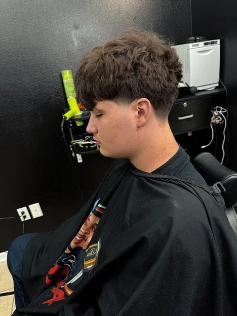 Skin fade haircut in Iowa City by FadezByBoda barber”