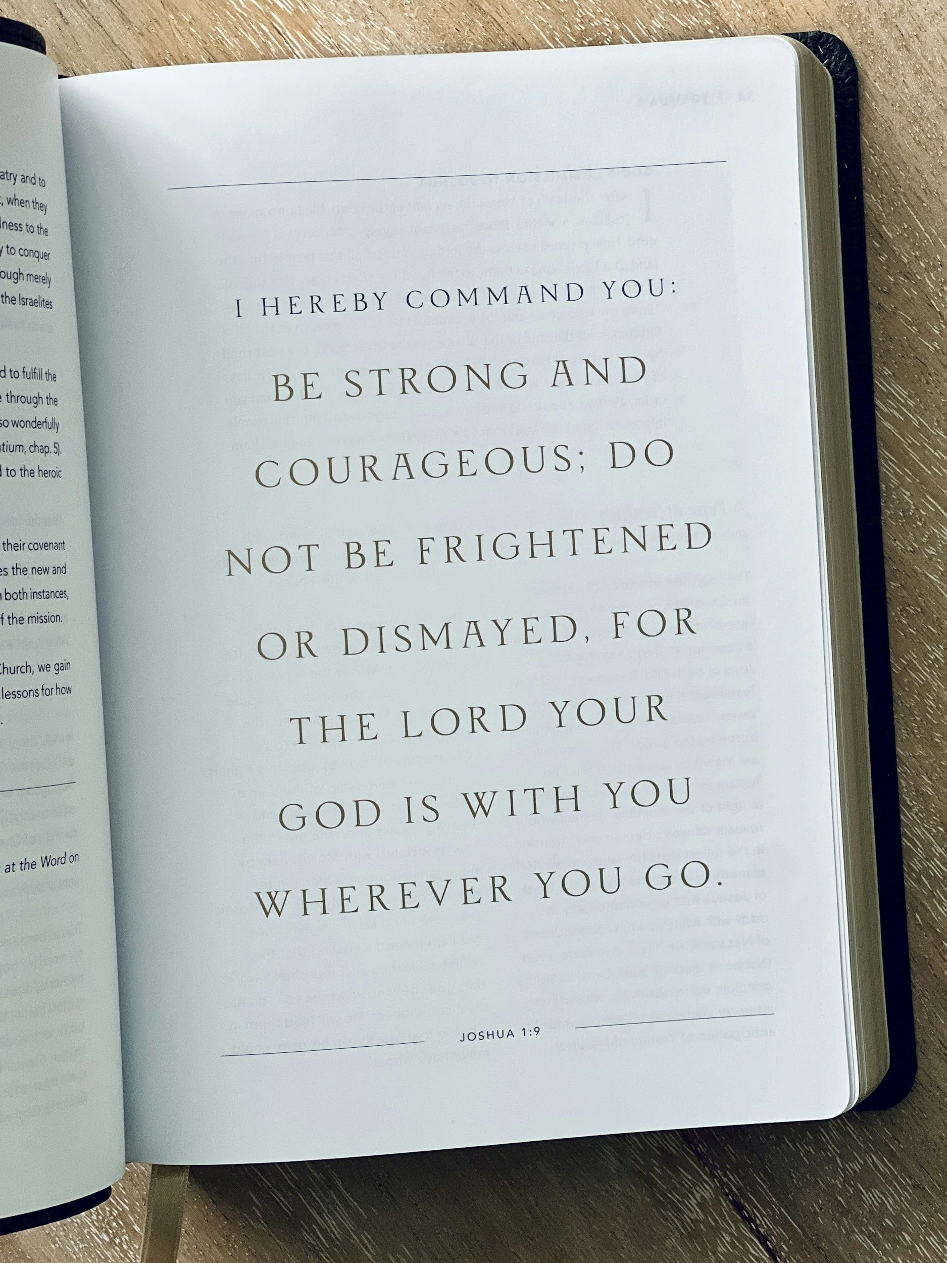 Open Bible showing a verse from Joshua 1:9, encouraging strength, courage, and faith in God's presence wherever one goes.