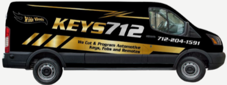 Side view of a black commercial van with yellow and white logo and text advertising KEY7112, a company specializing in key cut and program automotive services in Kegel, Florida, with a phone number 712-204-1591.