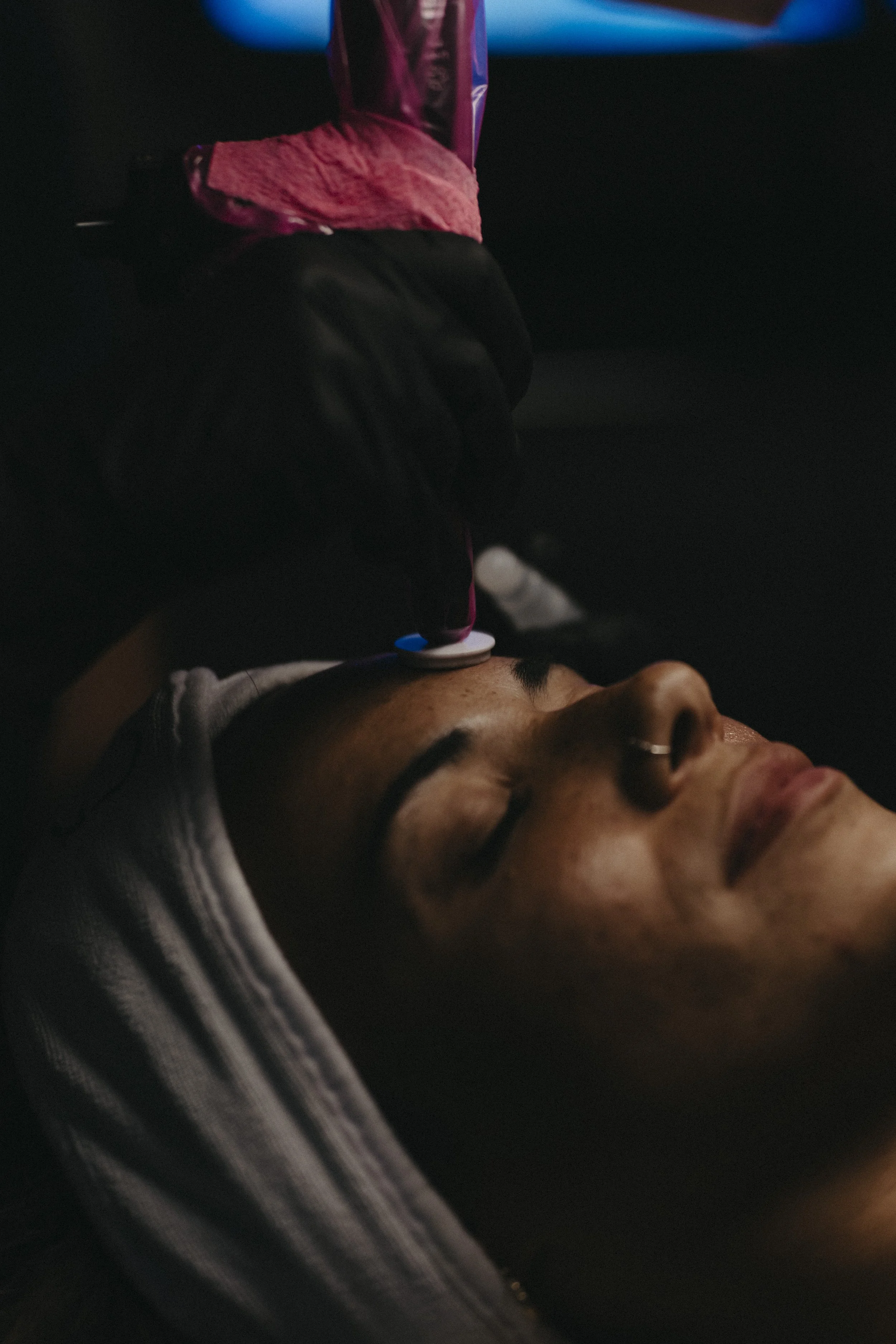 a woman getting a procell microchanneling facial at Belle Aesthetics, a med spa in Stewartstown PA