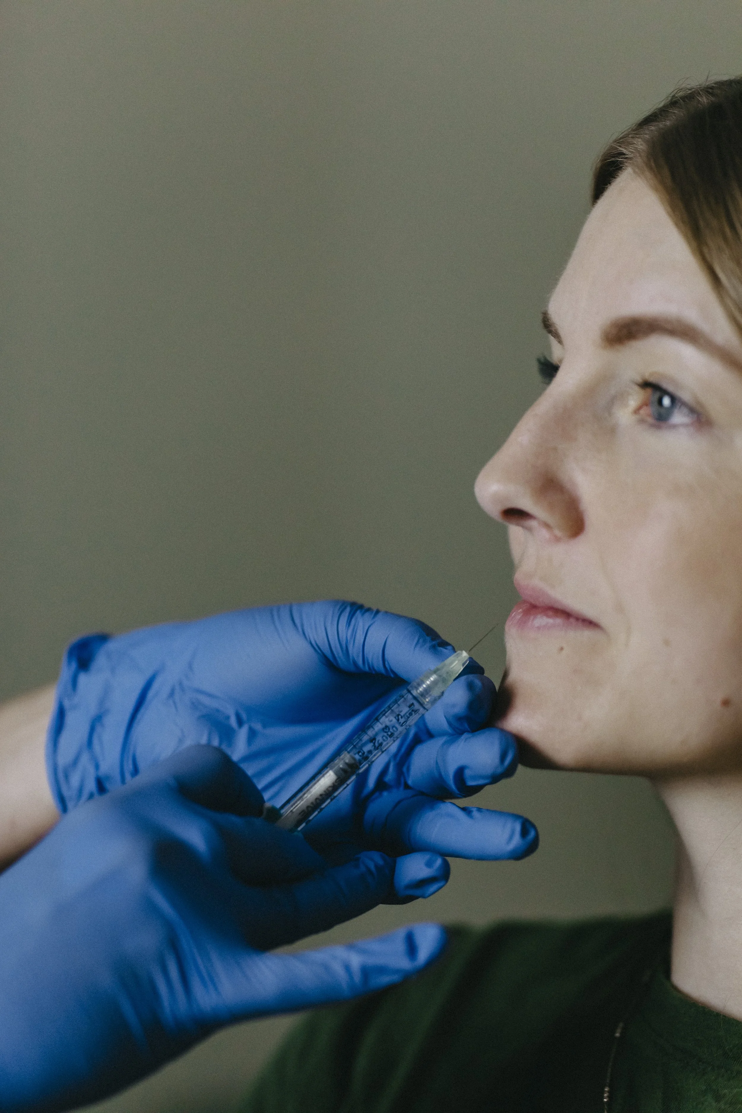 a woman getting lip injections at Belle Aesthetics, a med spa in Stewartstown PA