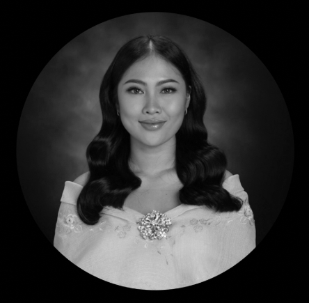Black and white emblem with stylized lions' heads and a banner saying 'All Hail the Power,' featuring a shield and a sun-like design at the top.