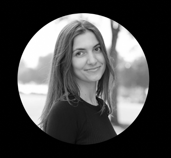 A black and white emblem featuring two profile faces of women with curly hair, facing opposite directions, surrounded by a shield and banners with the text 'FUTURE FORM IS TRAPPED' at the bottom, and various decorative elements.