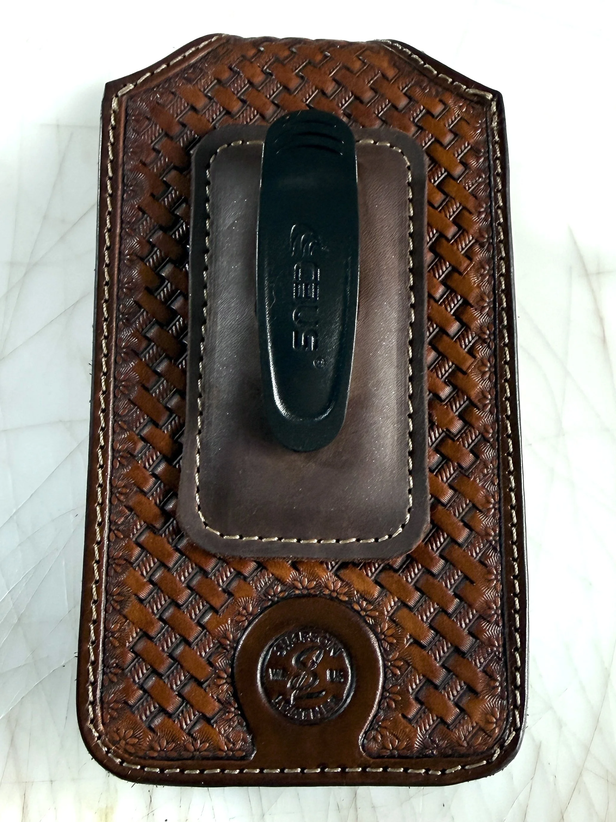 Custom tooled phone case with rotating belt clip 