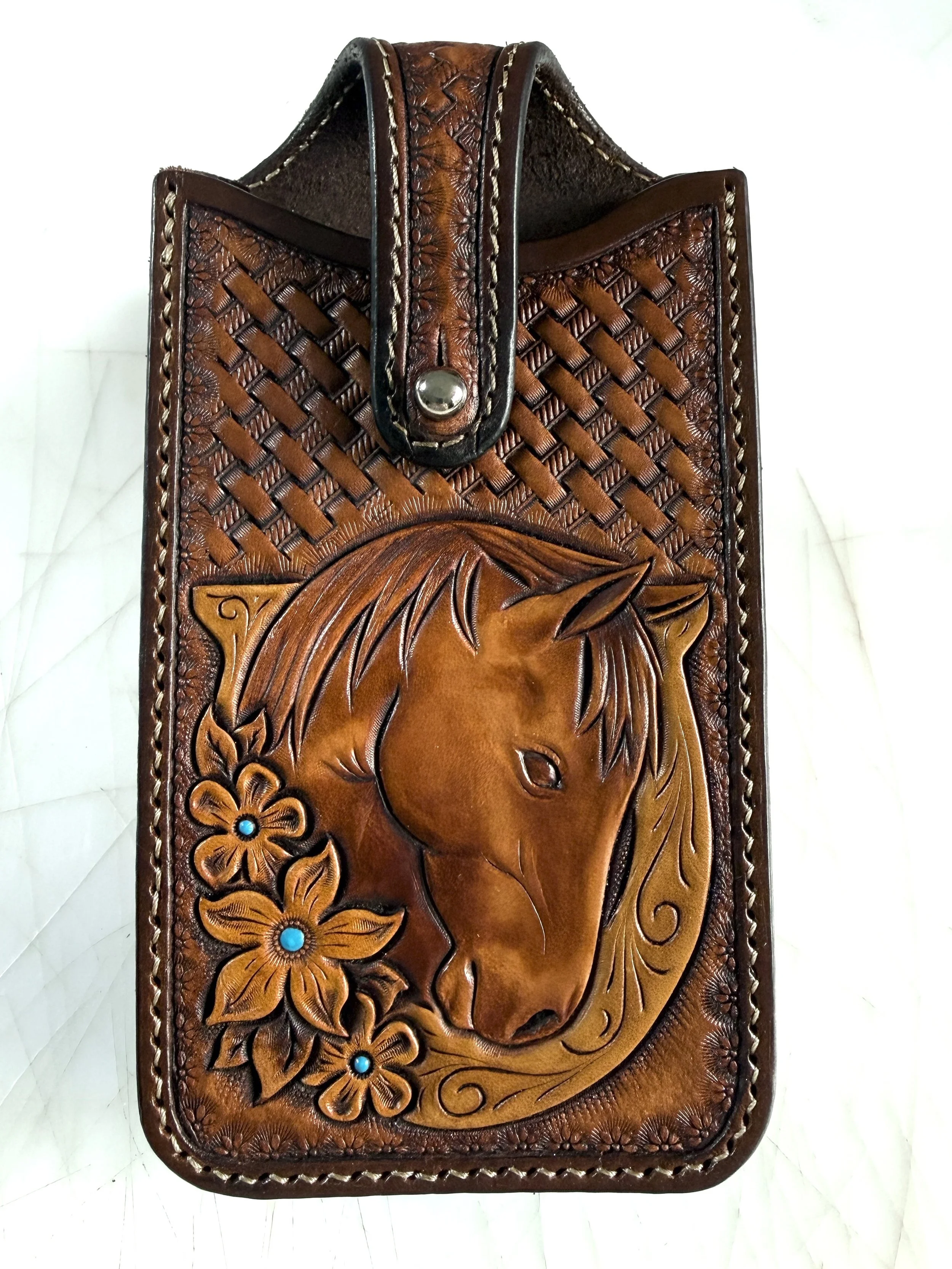 Custom tooled phone case with rotating belt clip 