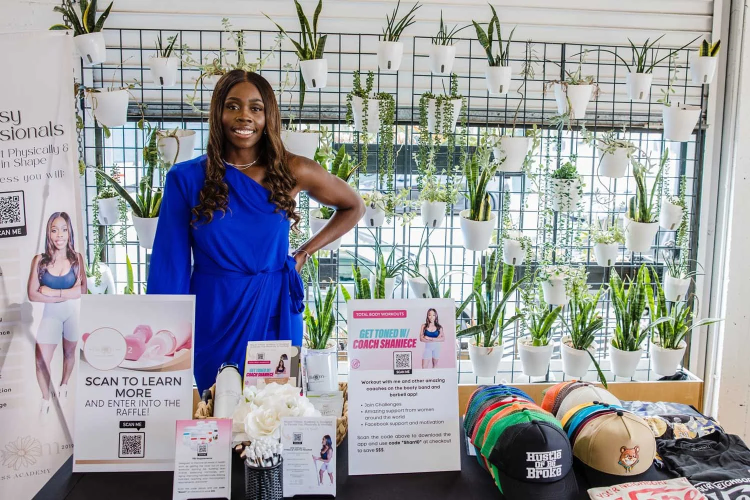 fitness-coach-Shaniece-Benson-at-impact-lab-networking-event-booth.jpg