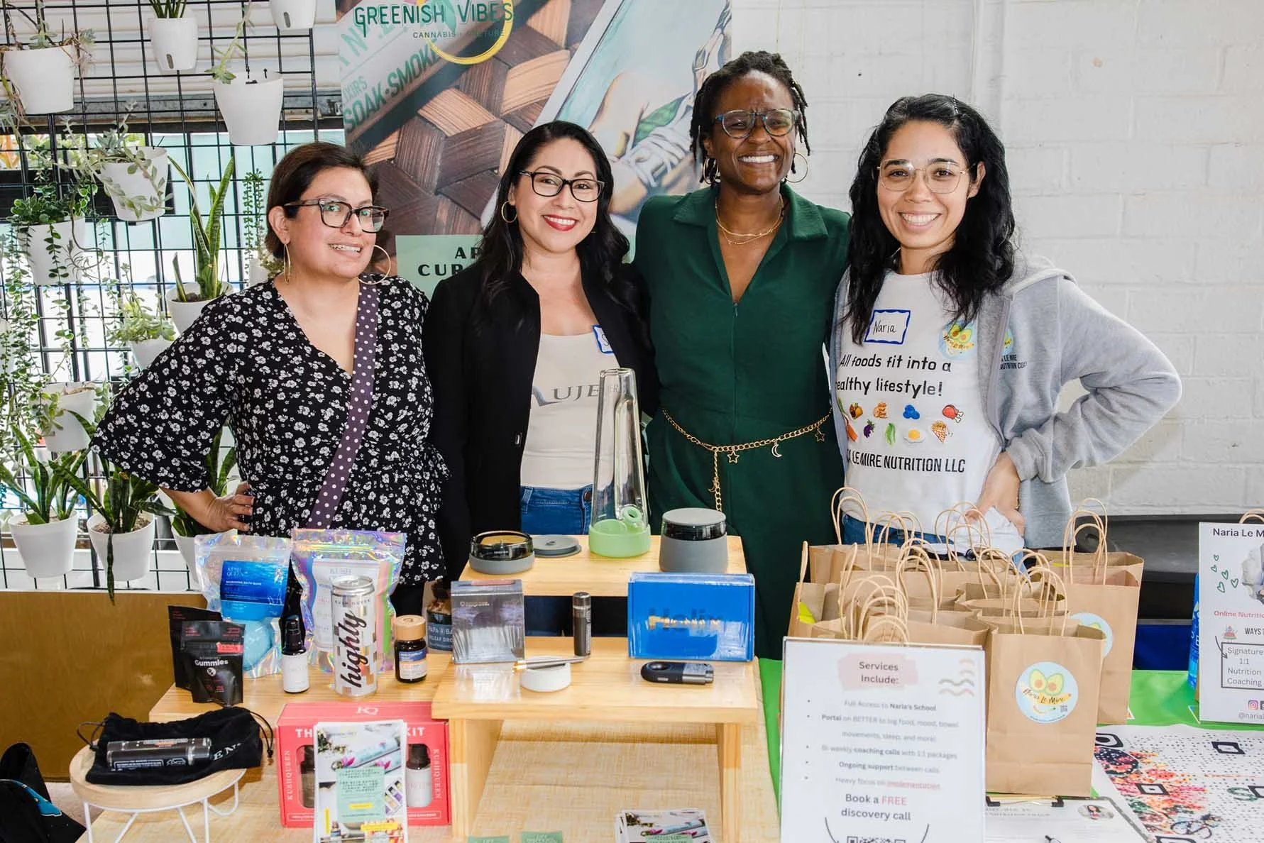 small-business-owners-smiling-with-products-at-impact-lab-networking-event.jpg