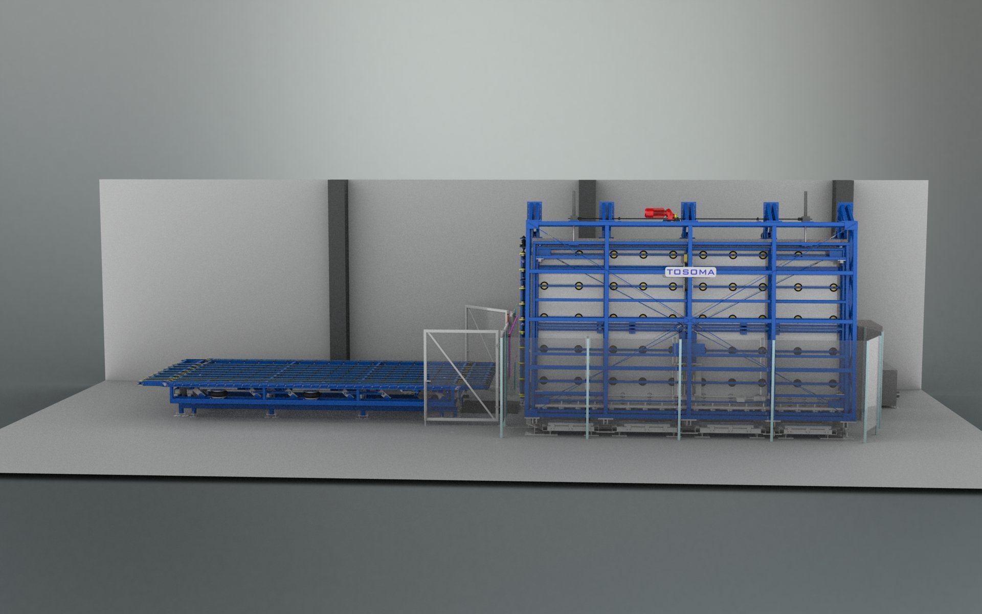 Technische Anlage für die Installation eines Glas-Automatwerks, bestehend aus einer flachen Plattform und einem großen blauen Rahmen mit verschiedenen Komponenten, gekennzeichnet mit dem Label "TOSOMA".