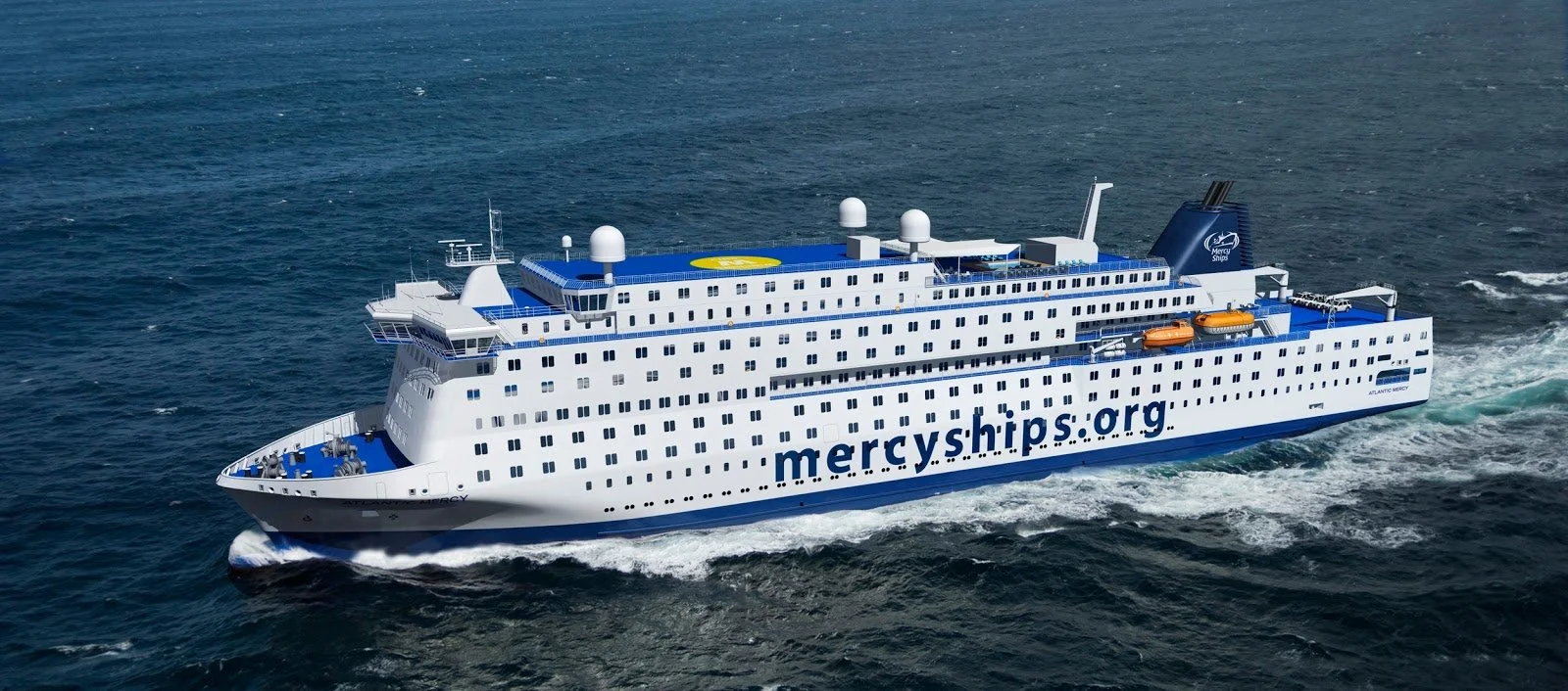 A large white cruise ship with blue accents sailing in the ocean, displaying the website mercyships.org on its side.