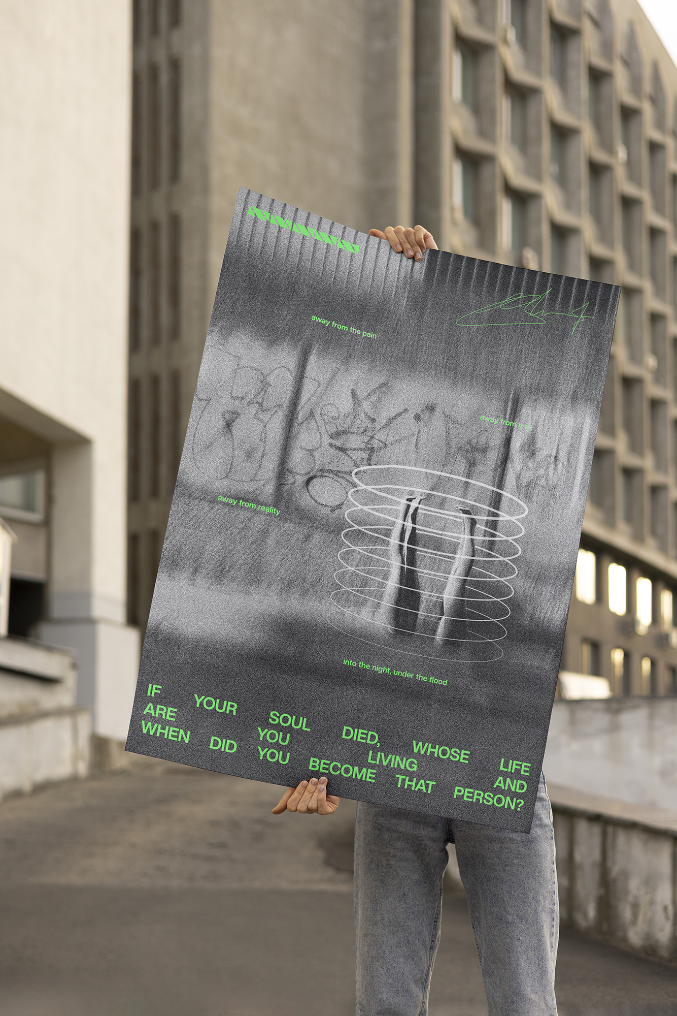 Person holding a large poster with text and images in an urban setting. The poster features a spiral shape, graffiti, and green text including phrases like 'away from the pain' and 'into the night, under the flood.'