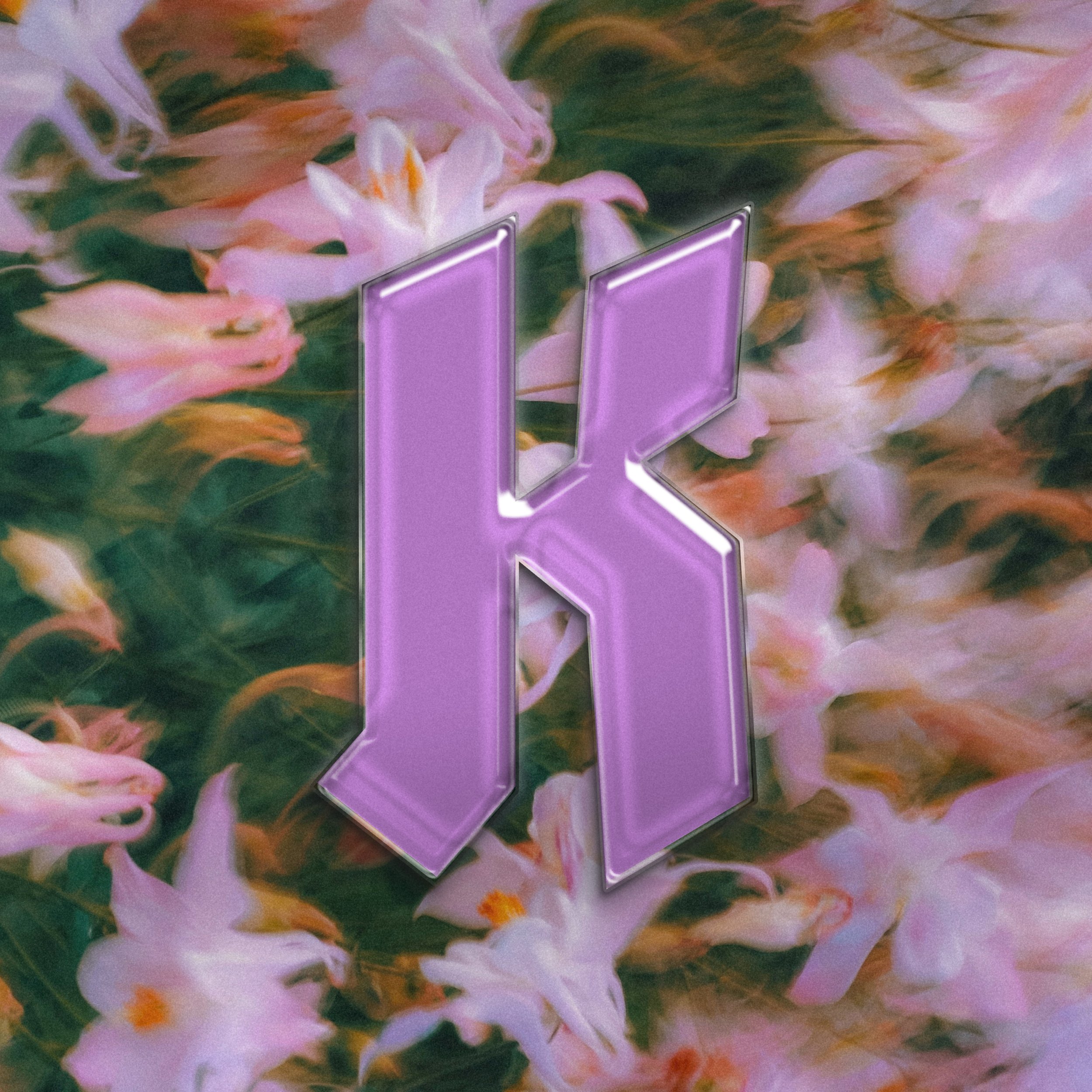 A digital graphic featuring letter K with a pink glass like effect, laid on a floral background consisting of pink and white flowers.