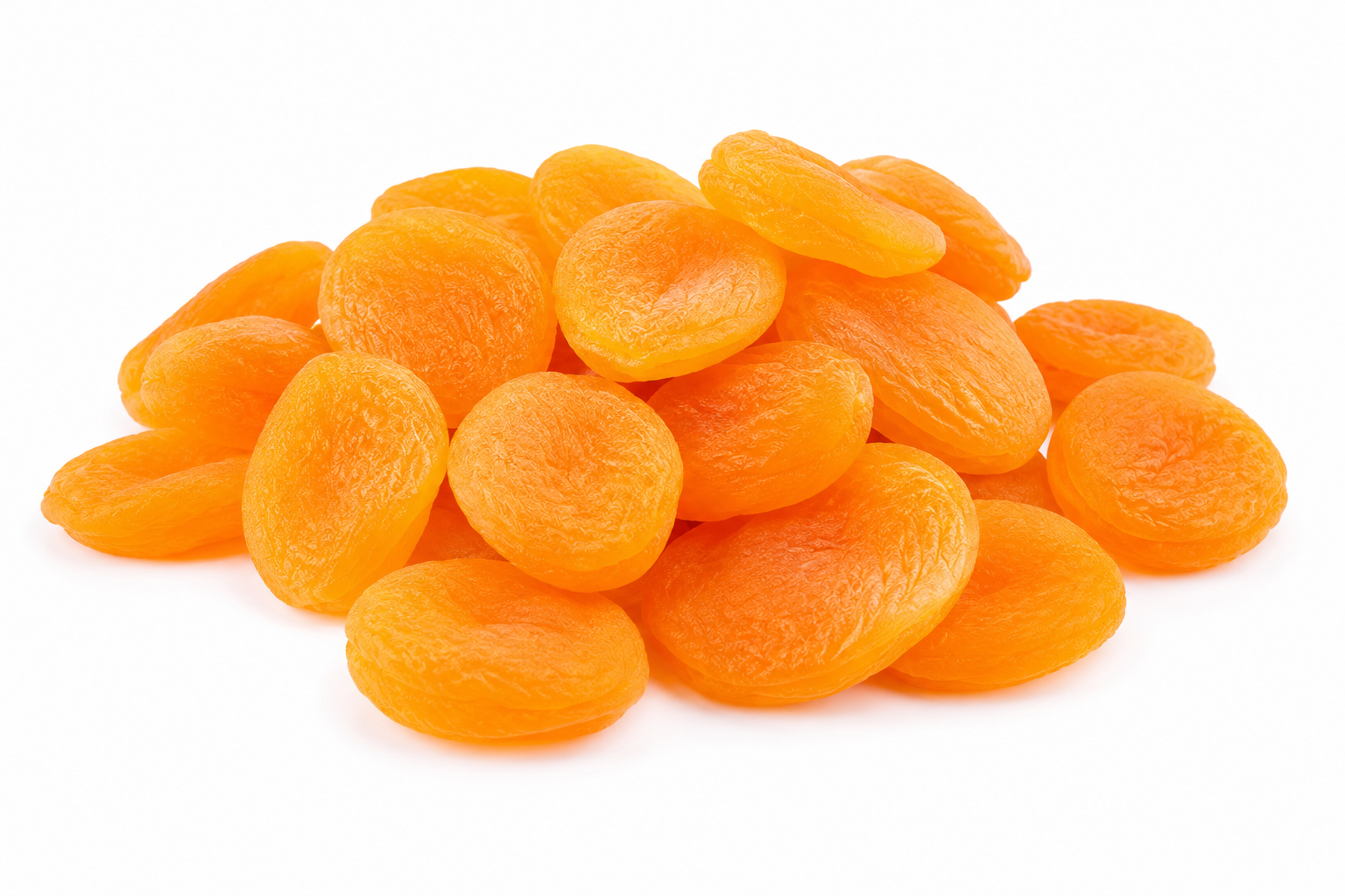 A pile of dried apricots against a white background.