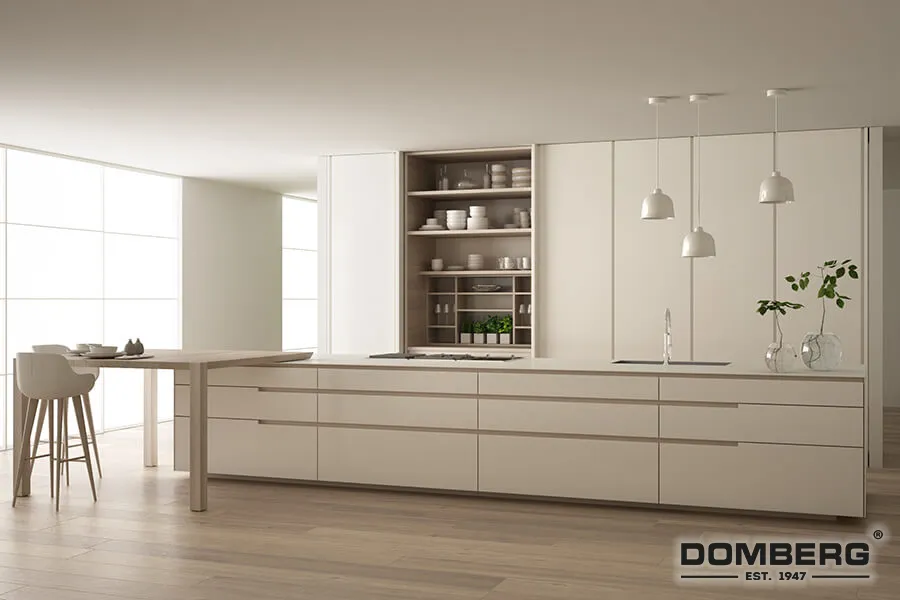 Modern minimalist kitchen with white cabinets, open shelves with dishes, a kitchen island, and three pendant lights, with large windows in the background.