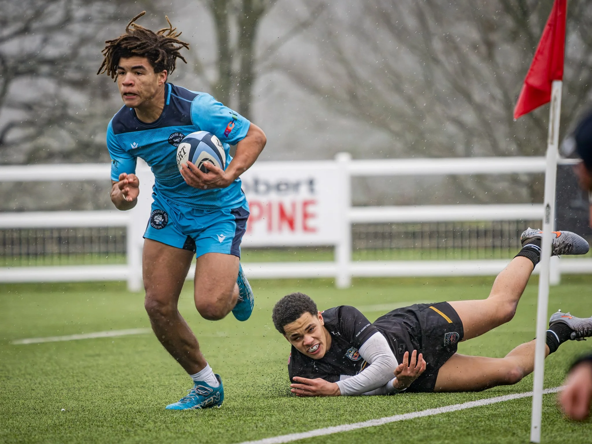 Keiji Ashaolu action shot, running with ball