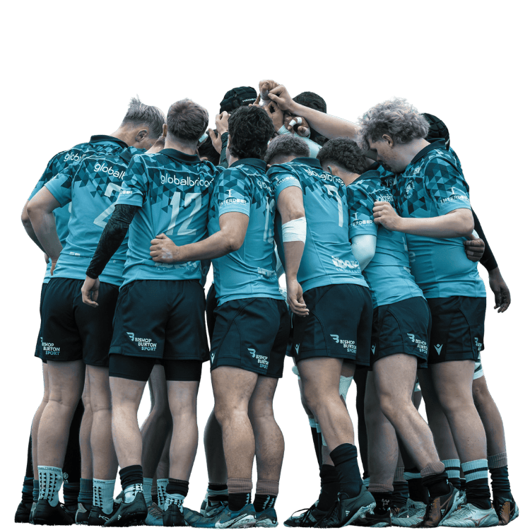 A rugby team huddled together, wearing matching blue jerseys with sponsor logos, with their arms around each other in a show of unity.
