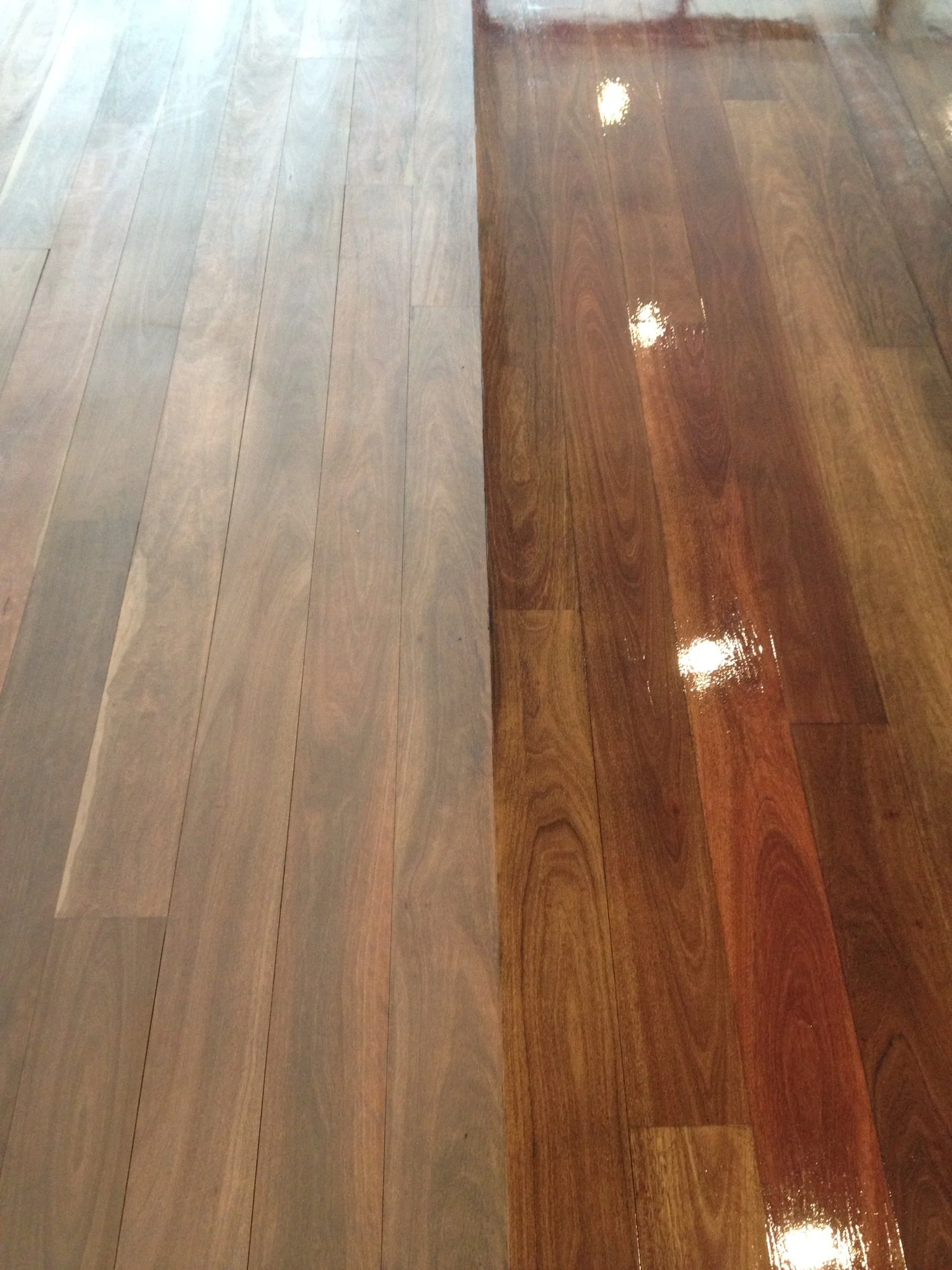 Comparison of unfinished wooden floor on the left and finished, polished wooden floor on the right.