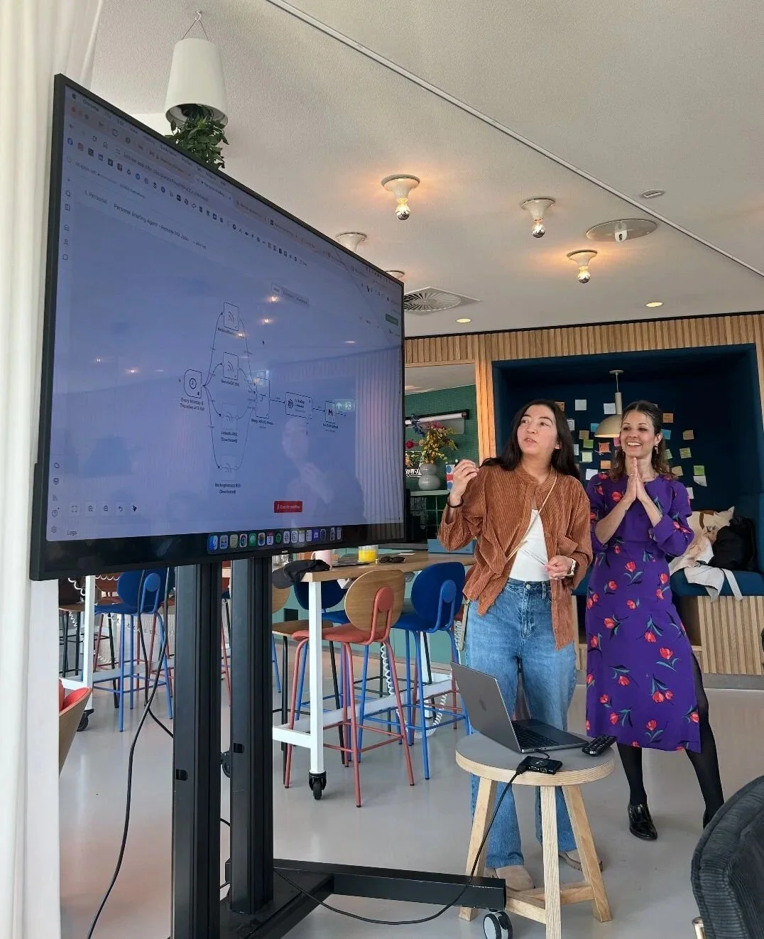 Rafaela Buena running an AI training session for a team