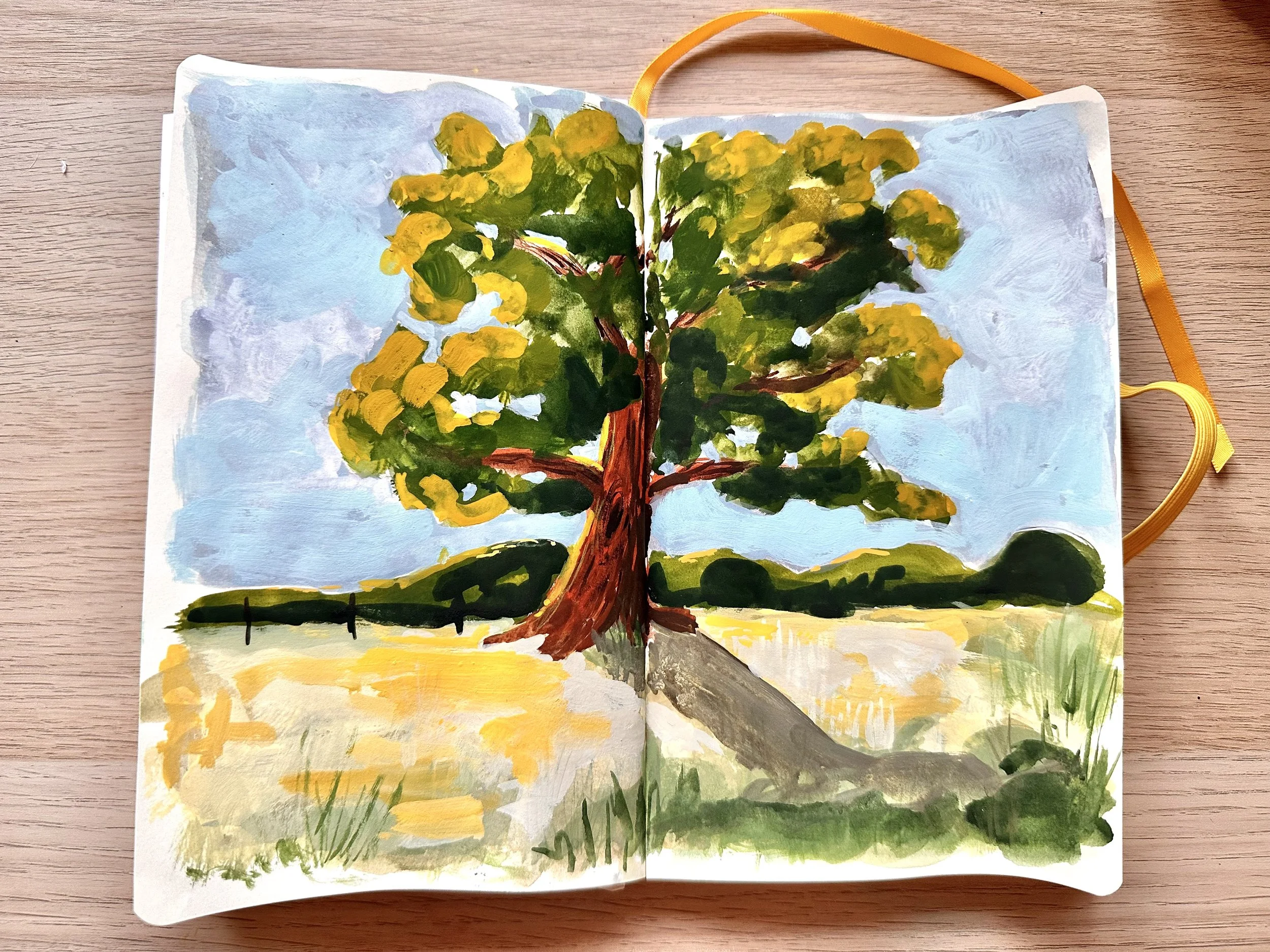 A watercolor painting of a large tree on a field, with a blue sky and distant green hills in the background.