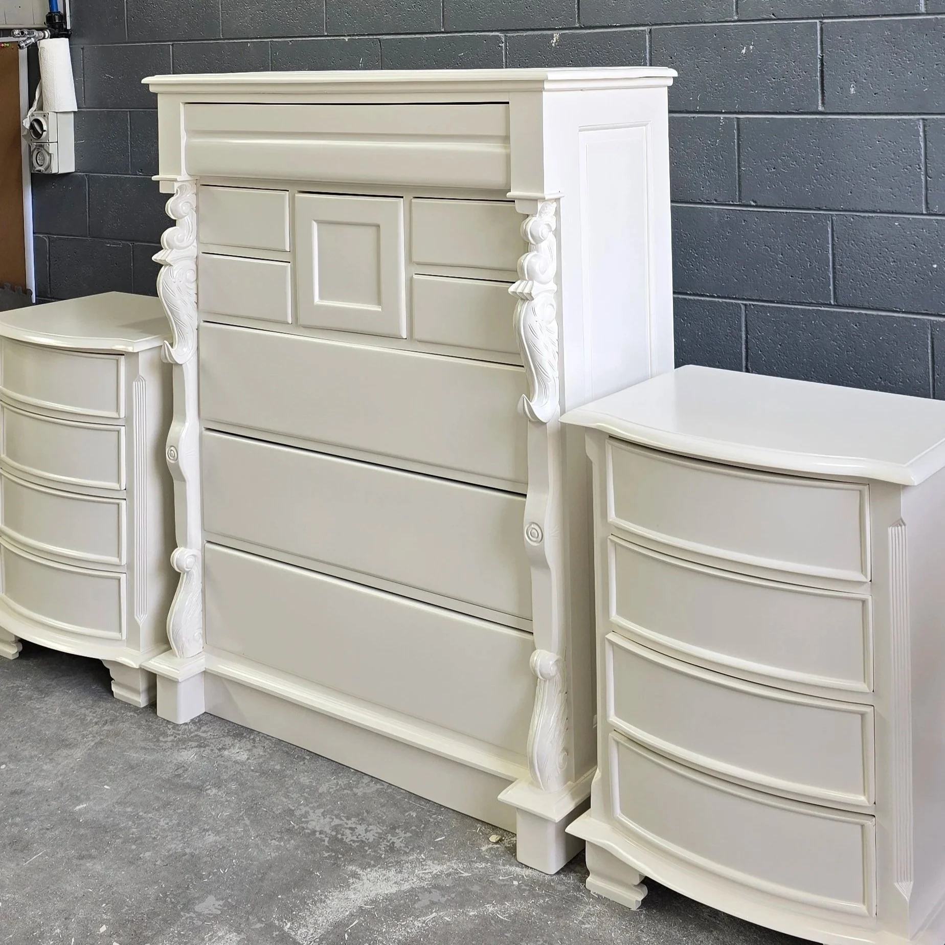 Detailed polyurethane spray painted finish on a refurbished chest of drawers and bedside tables. Crisp, fresh finish. 