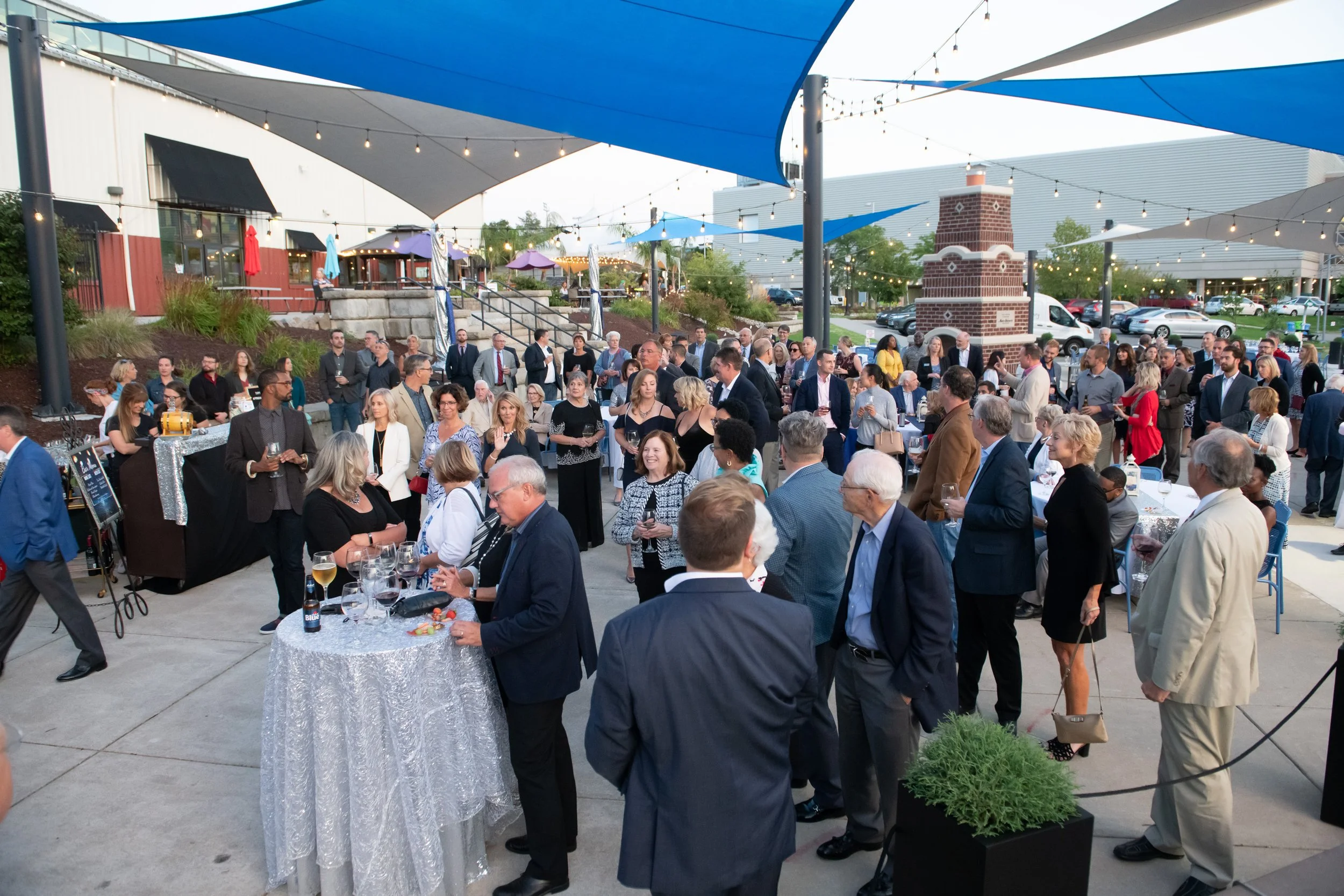 Rotary Park's plaza filled with people for an event