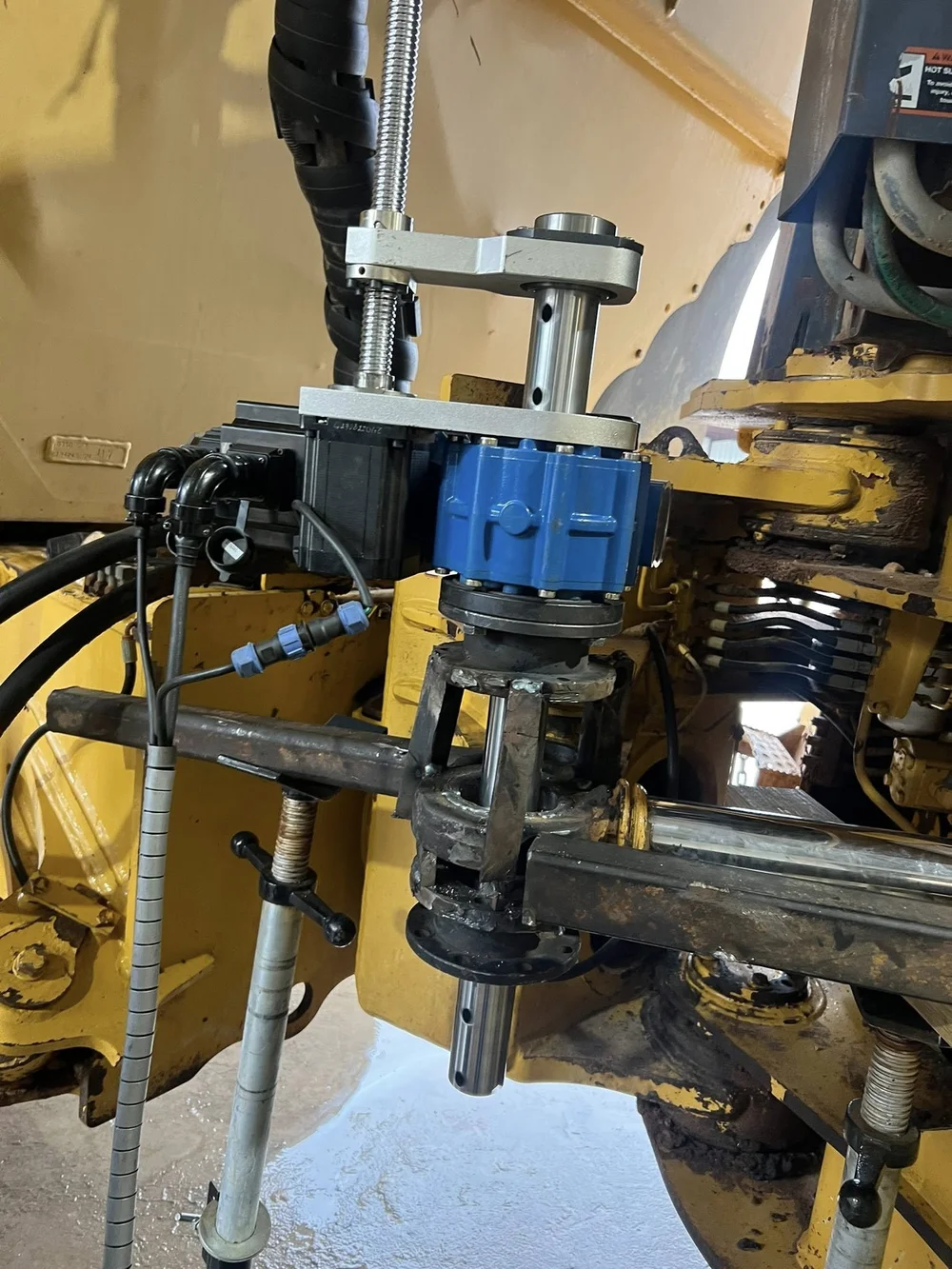 Portable line boring equipment mounted on heavy machinery